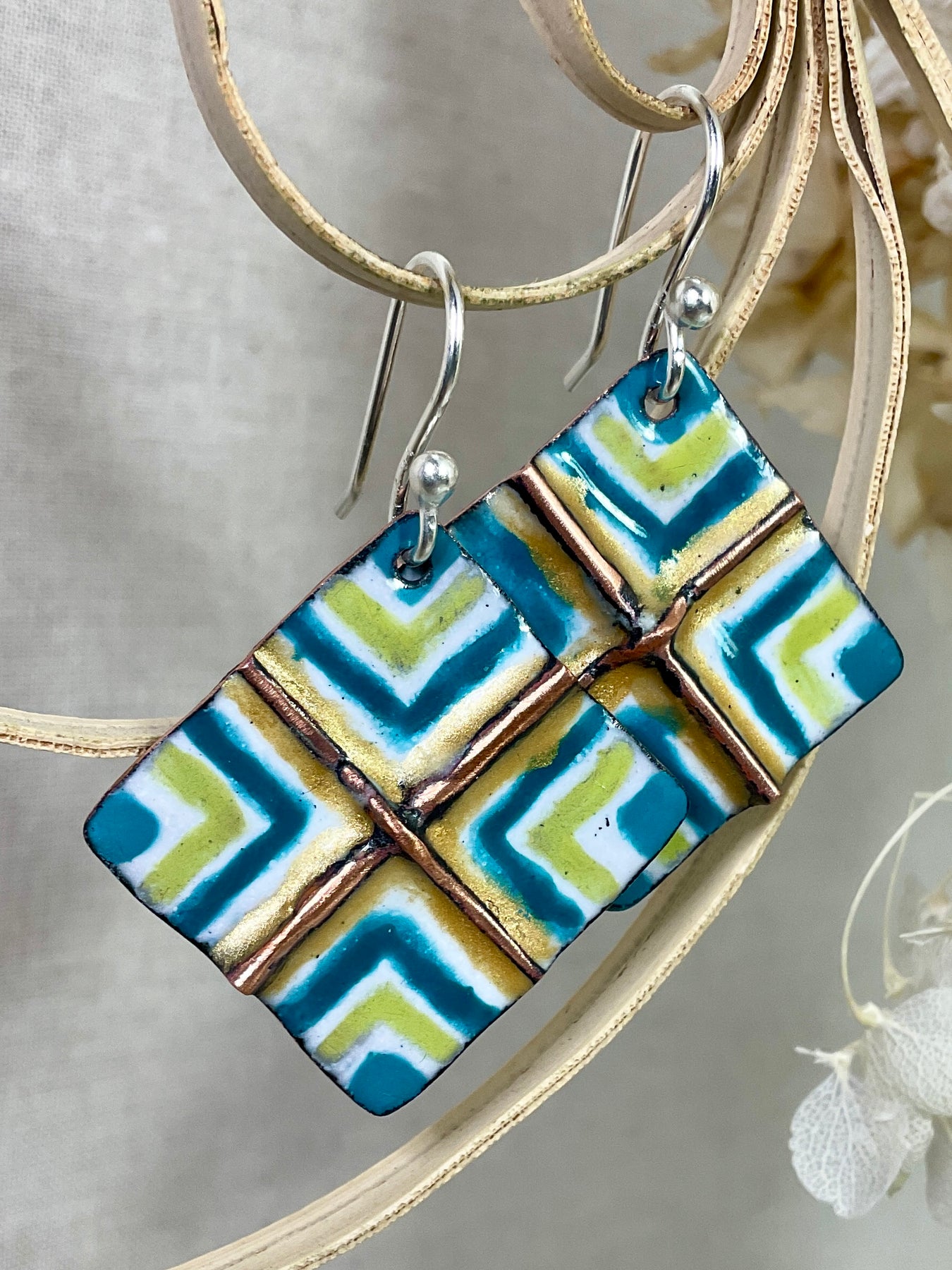 White, gold, teal and green fold form enamel earrings. Handmade