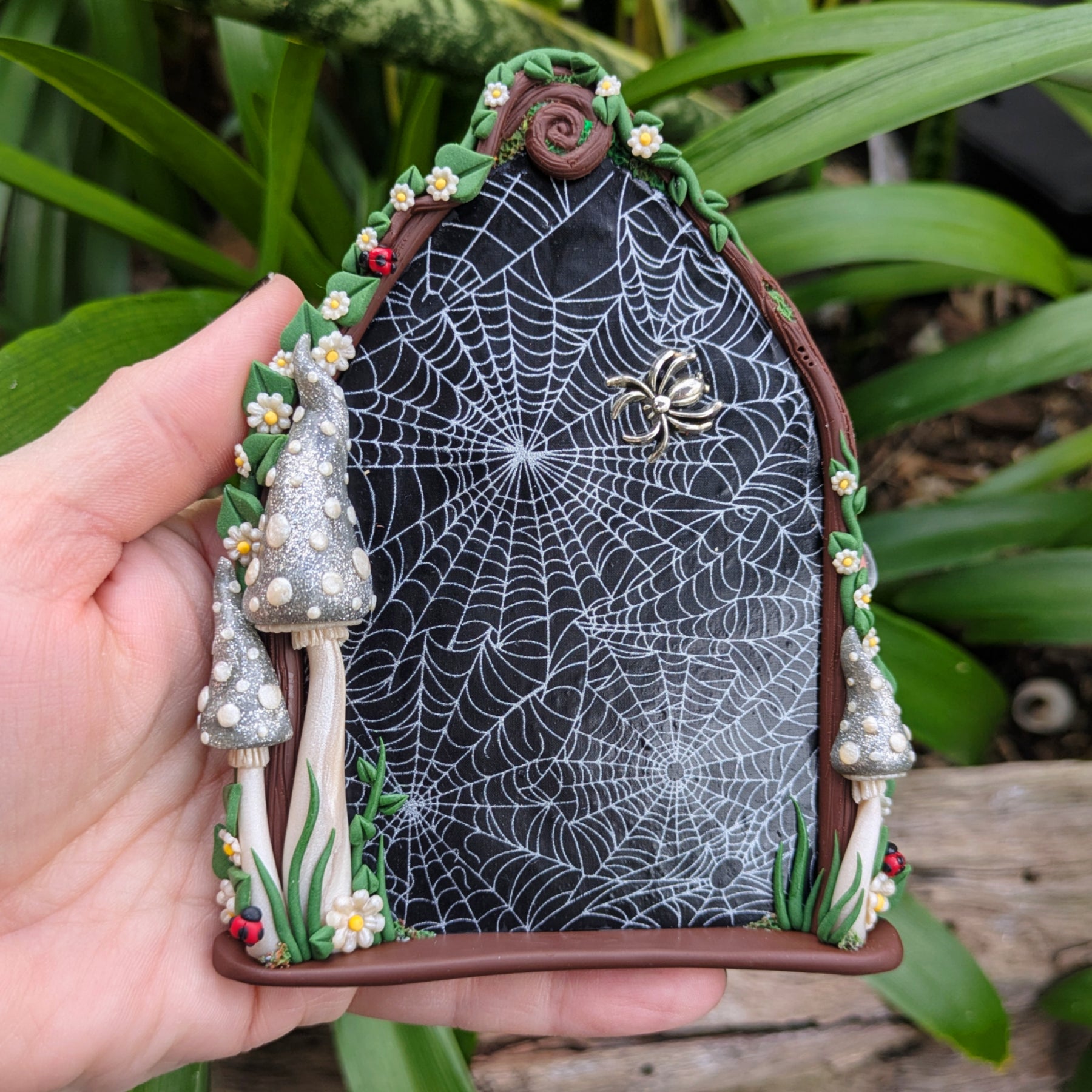 Spiderweb Forest Fairy door with glow in the dark mushrooms