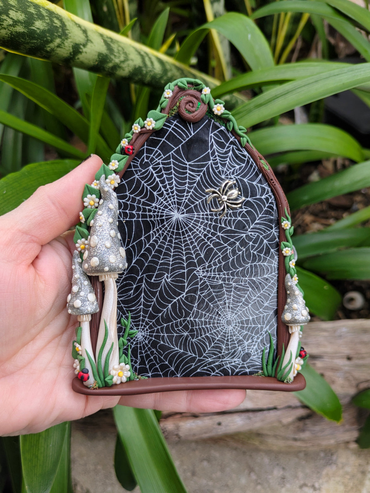 Spiderweb Forest Fairy door with glow in the dark mushrooms