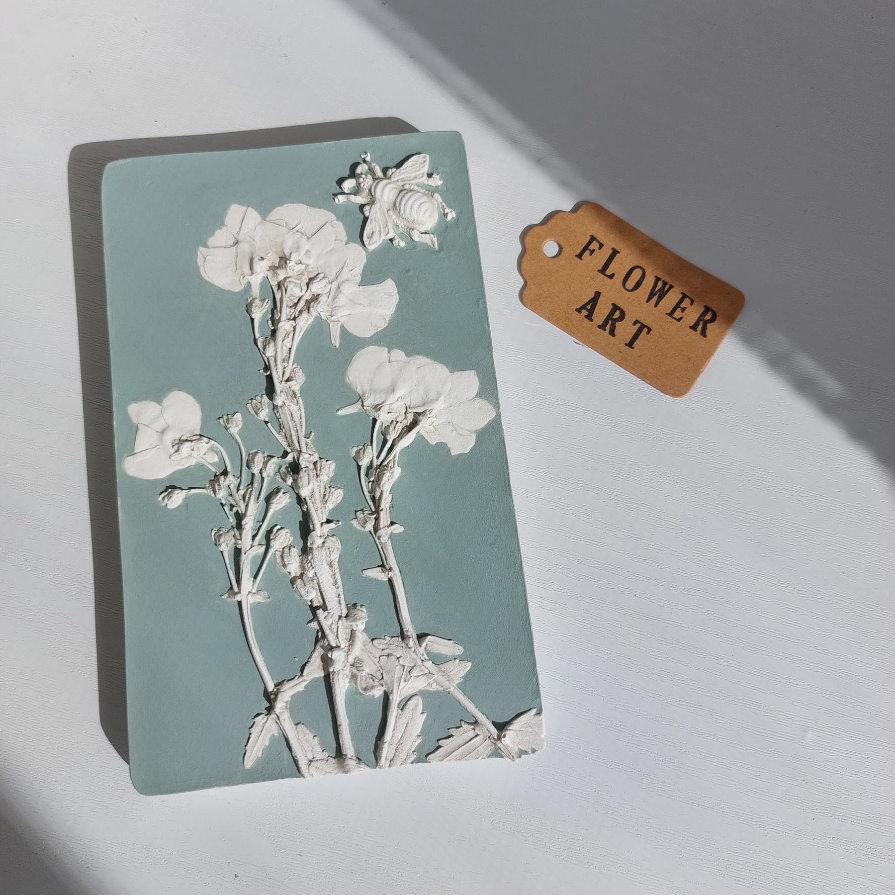 Plaster Plaque Of Nemesia Flowers With A Bee