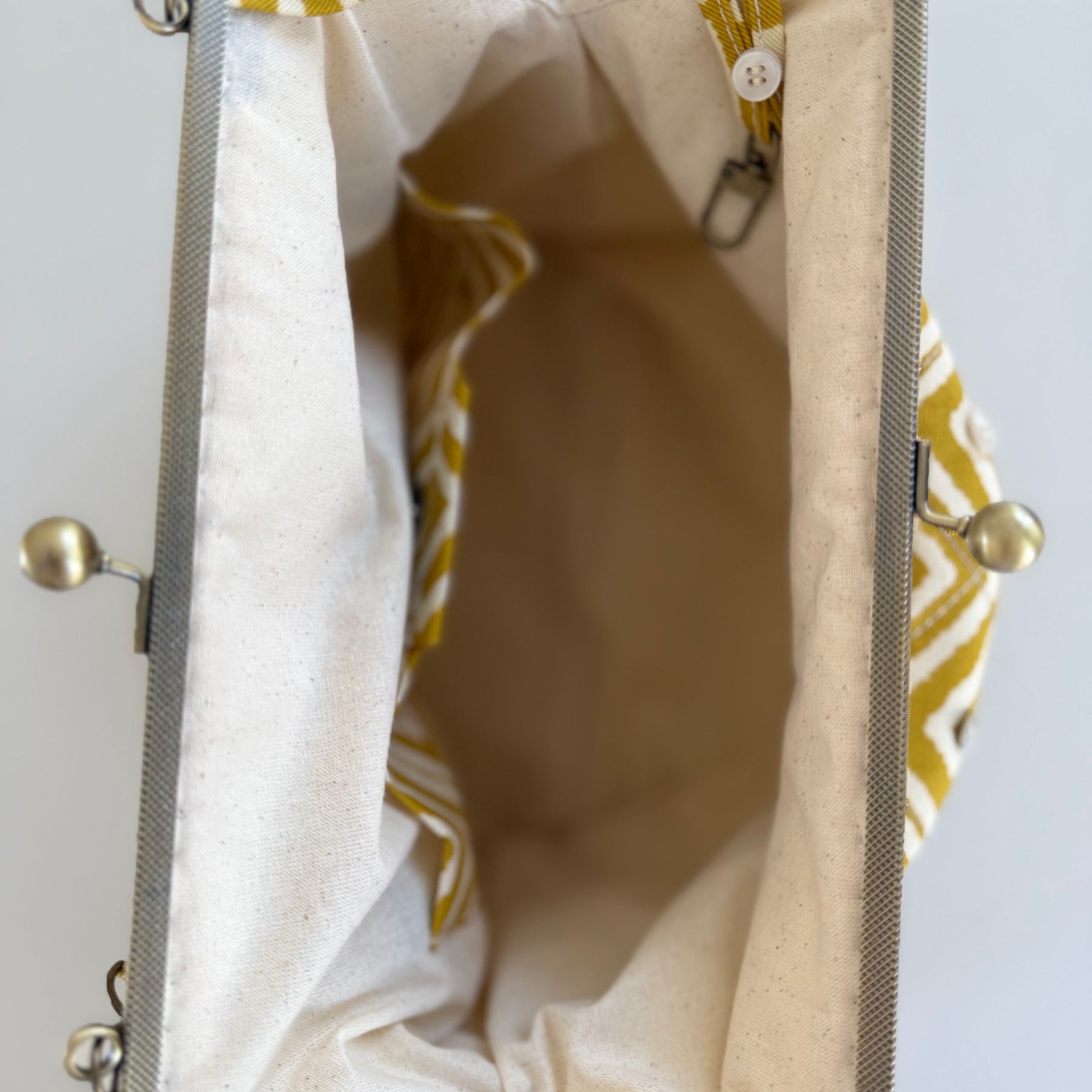 Metal frame oversized purse