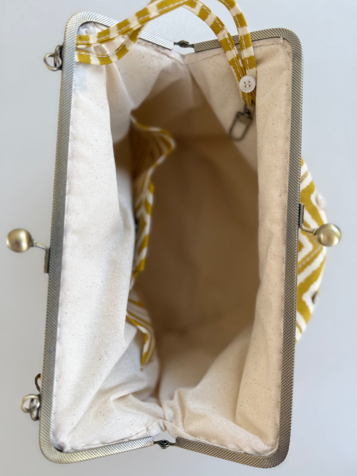 Metal frame oversized purse