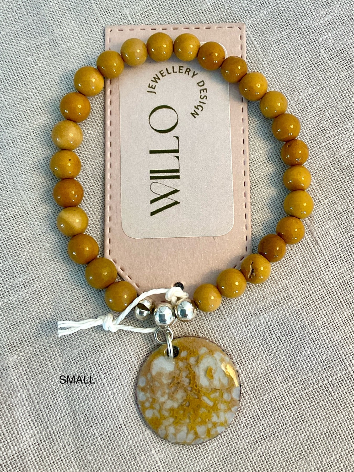 Wood Jasper gemstone bracelet with enamel charm.