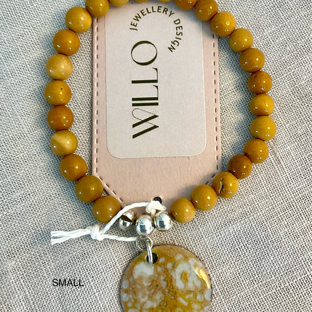 Wood Jasper gemstone bracelet with enamel charm.