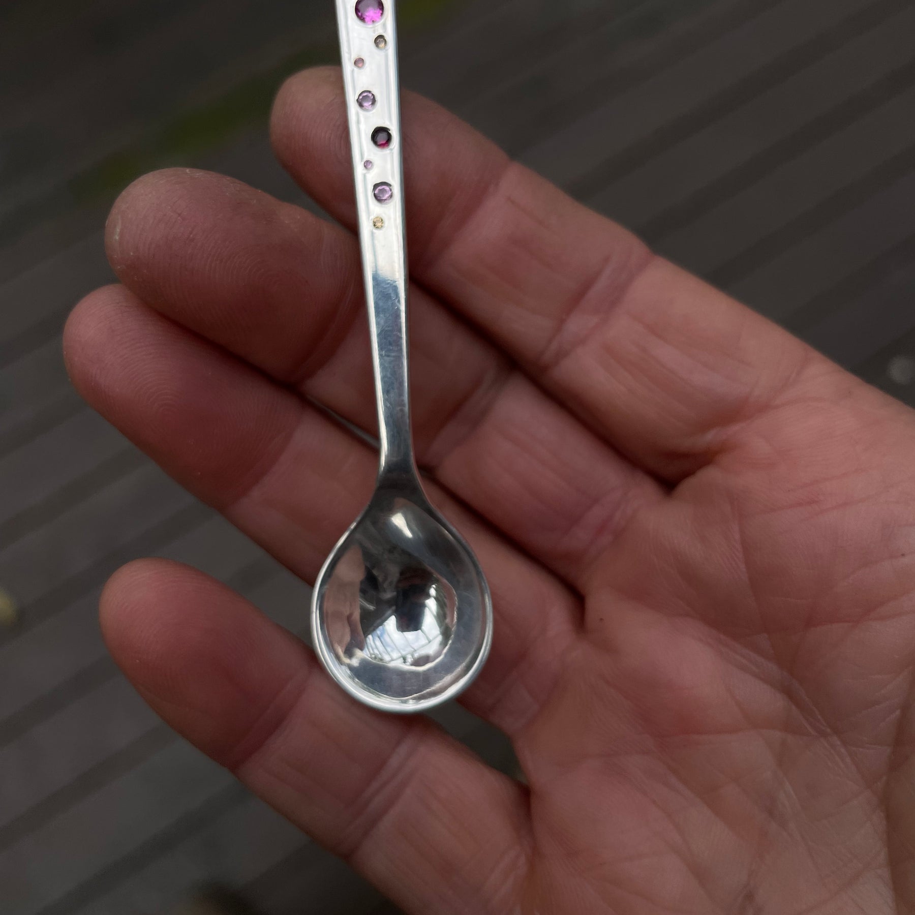 Sterling silver salt spoon with 12 lab sapphires