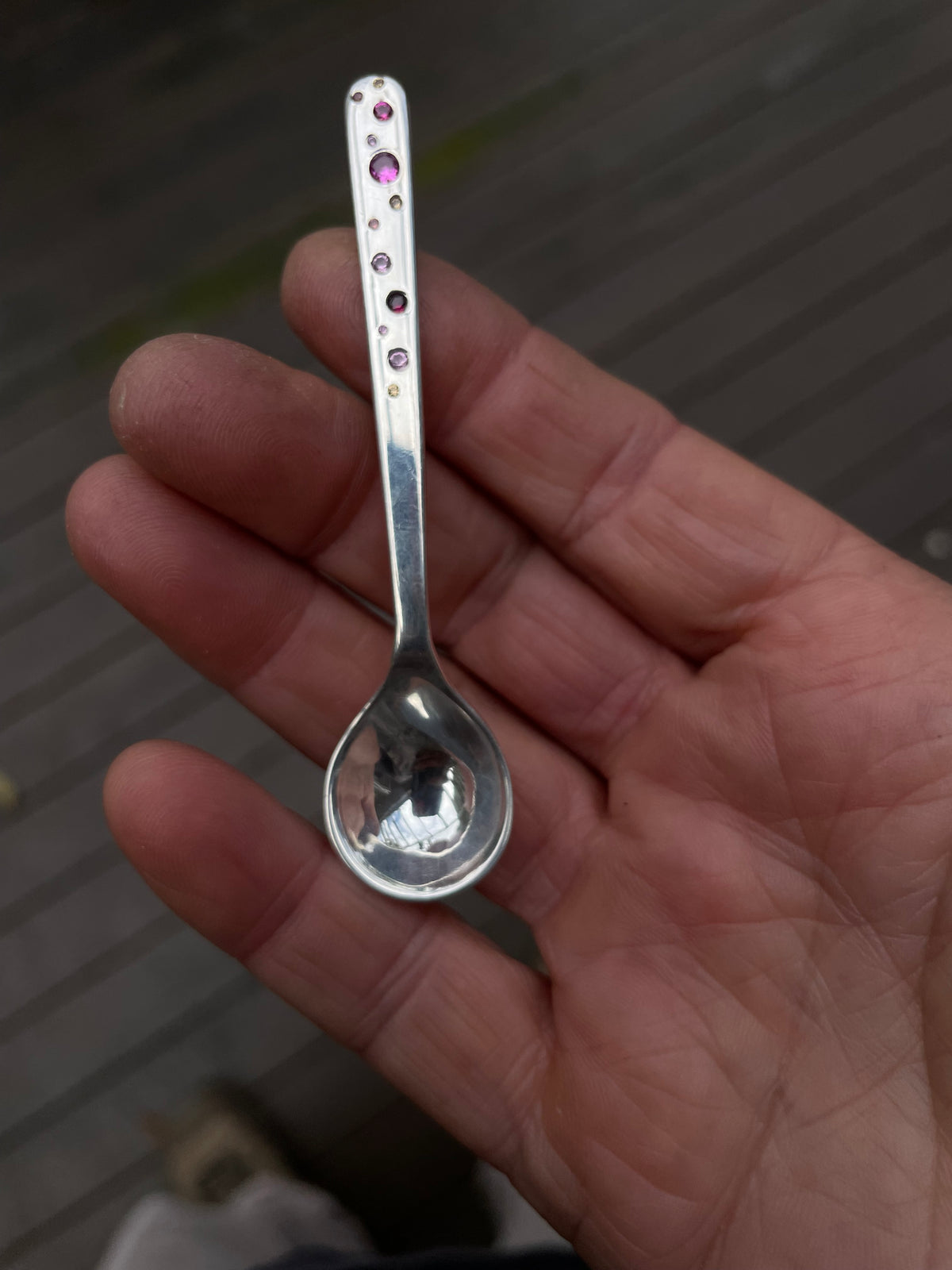Sterling silver salt spoon with 12 lab sapphires