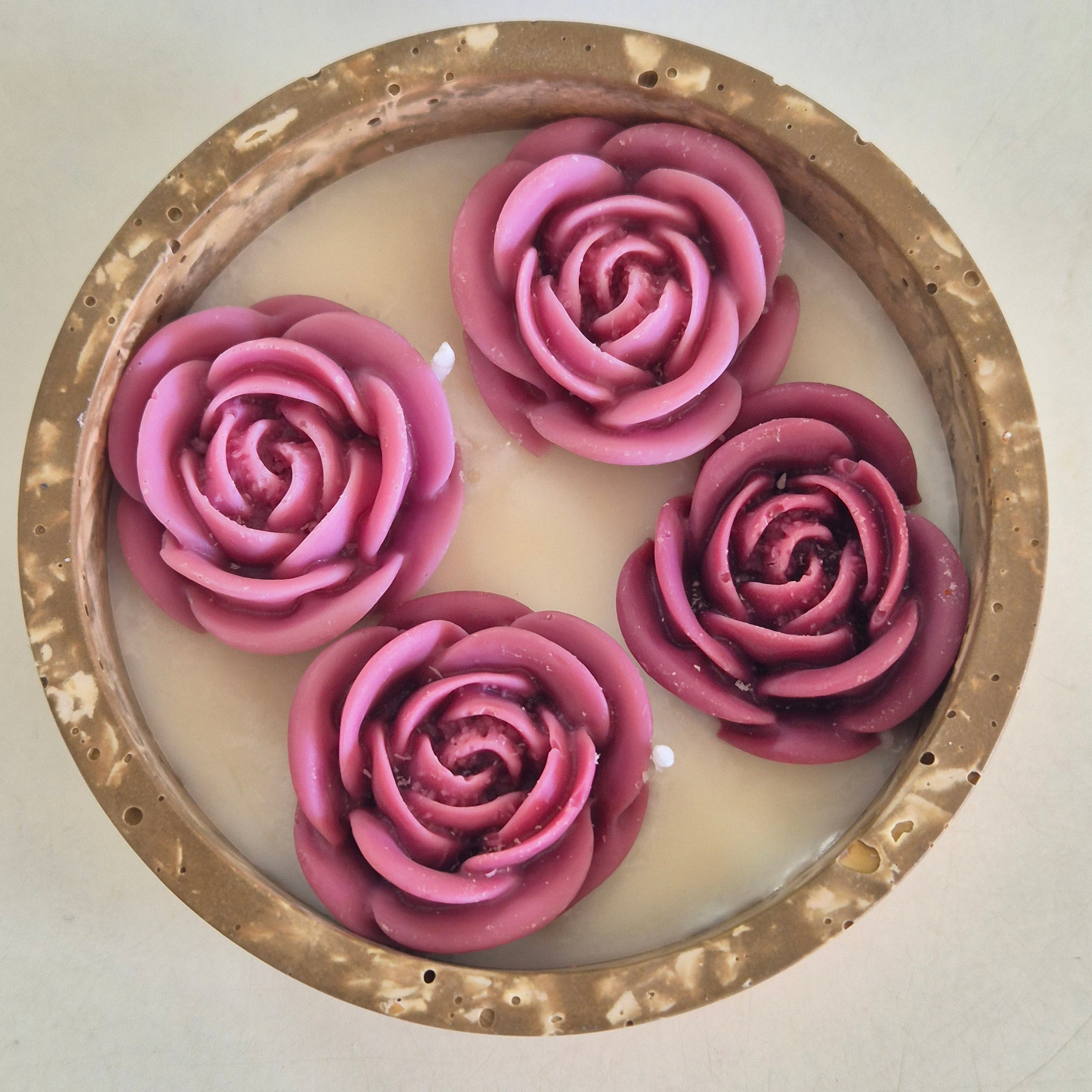 Round fluted brown concrete bowl candle with burgundy roses