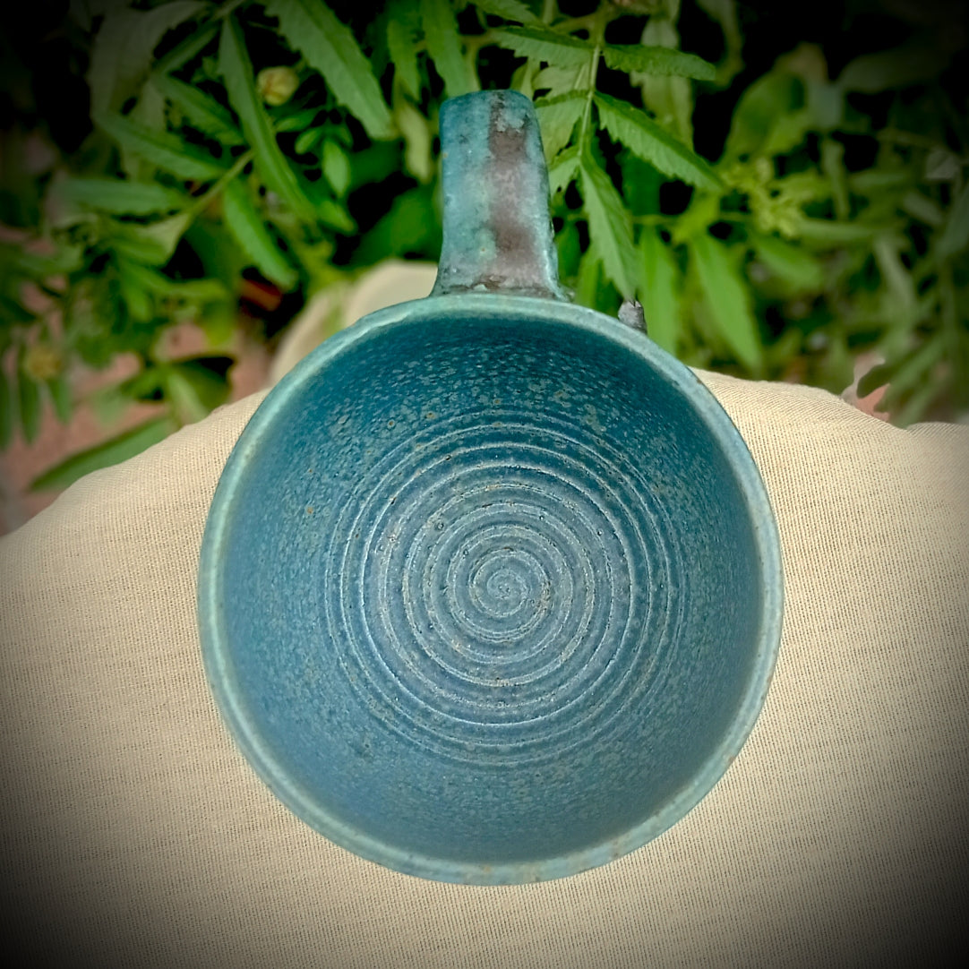 Blue Fluted cup with amber flecks