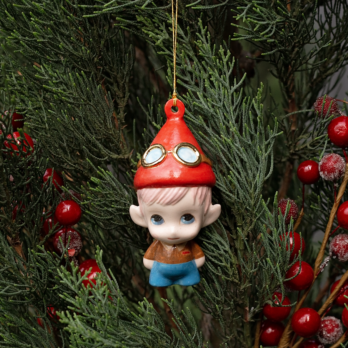 Handmade Porcelain Christmas ornament. One-of-a-kind. Malakai the Pilot Elf.