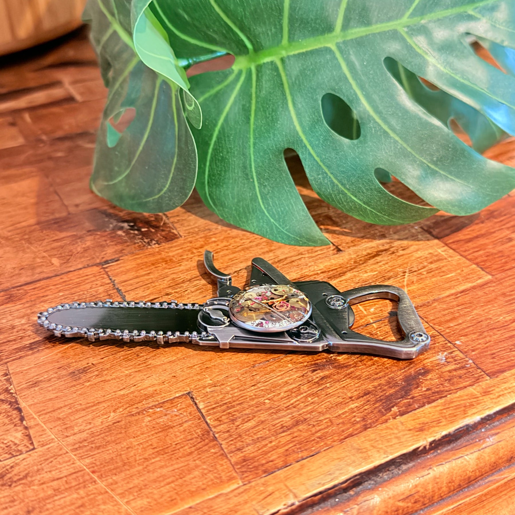 Steampunk watch parts  bottle opener (Chain Saw)