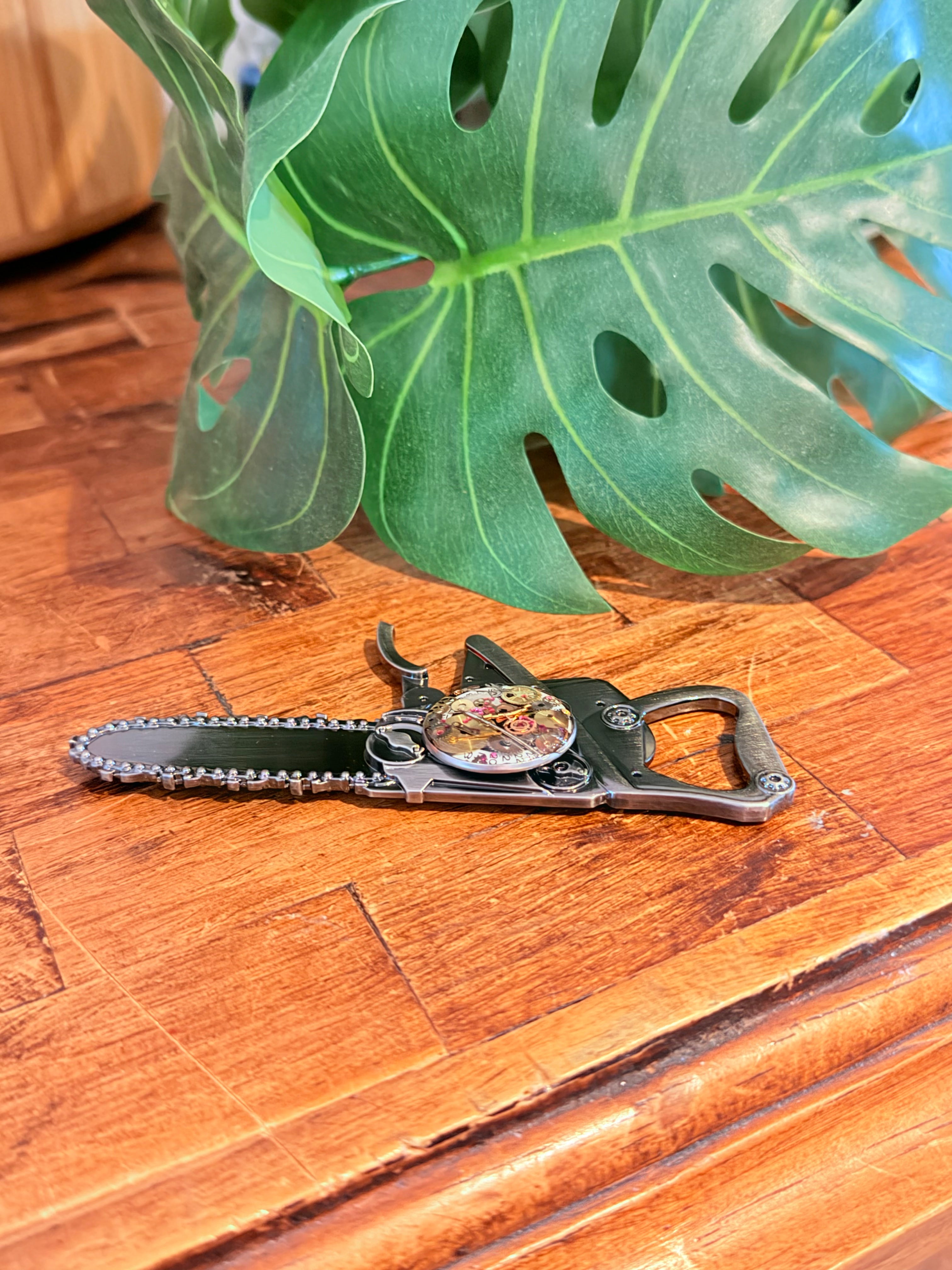 Steampunk watch parts  bottle opener (Chain Saw)