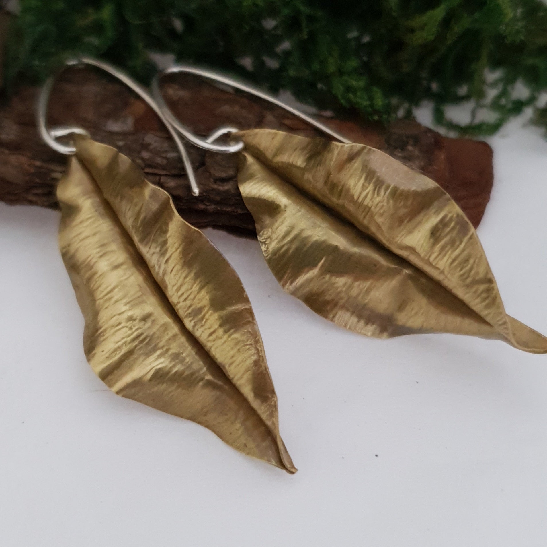 Golden brass leaf earrings