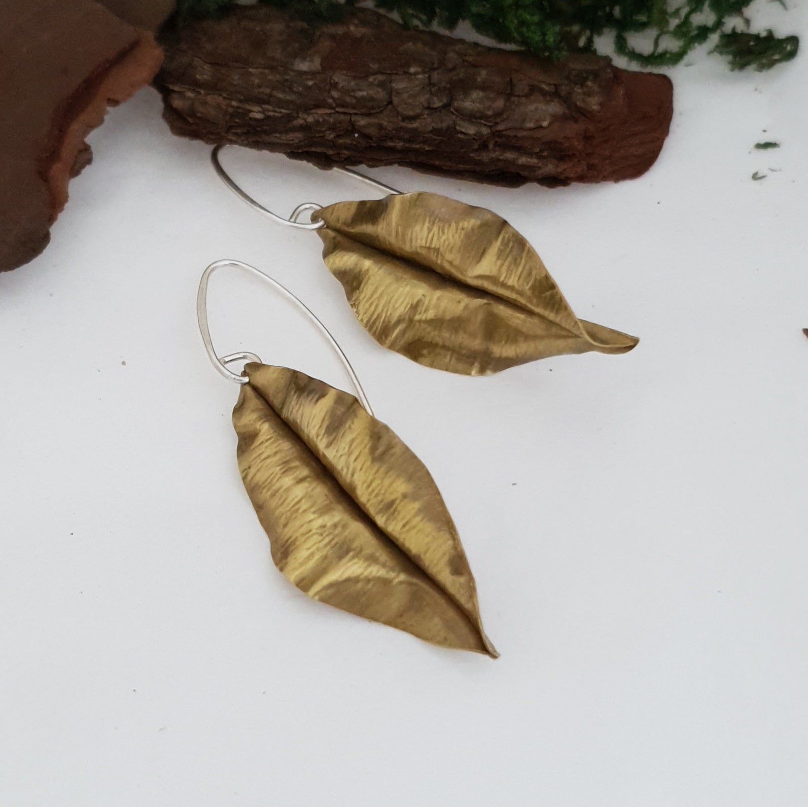 Golden brass leaf earrings