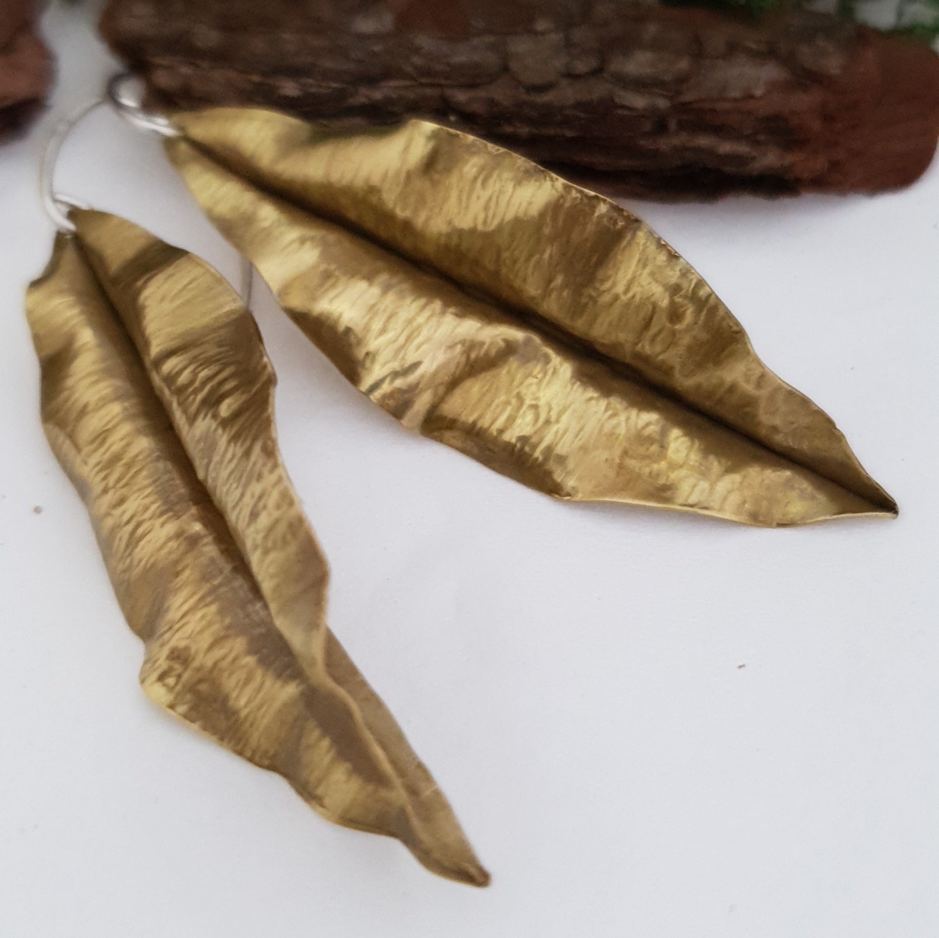 Golden brass leaf earrings