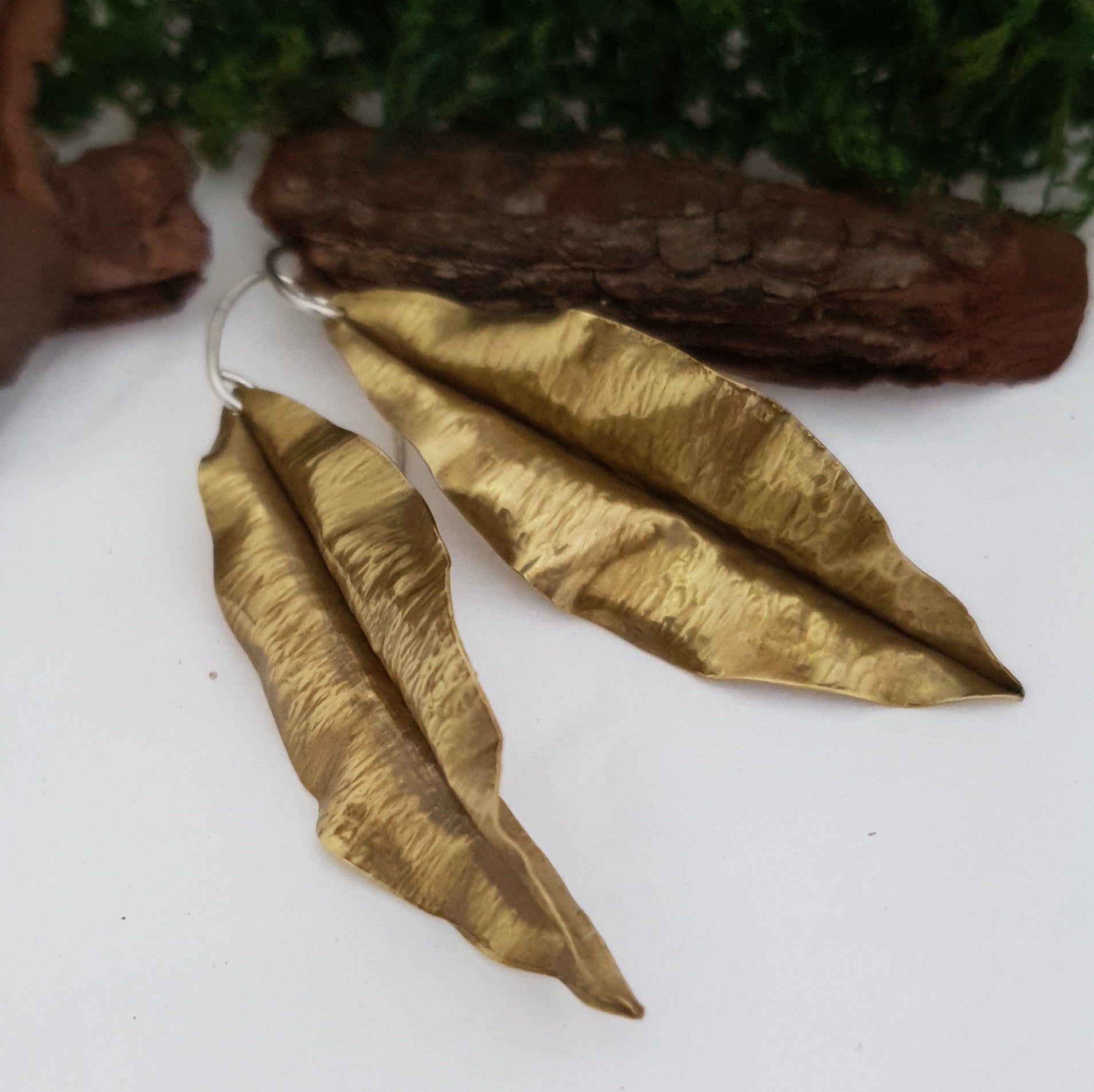 Golden brass leaf earrings