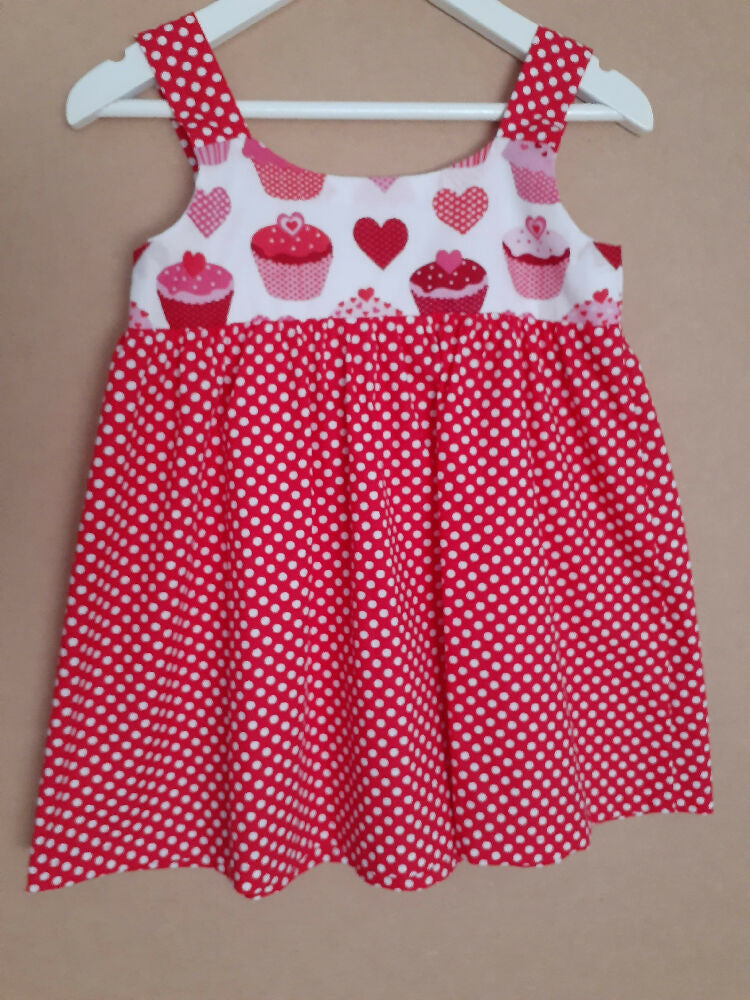 Cute child's dresses sizes 1-6. One-Of-A-Kind Print Bodice with Contrasting Spotty Skirt & Straps.