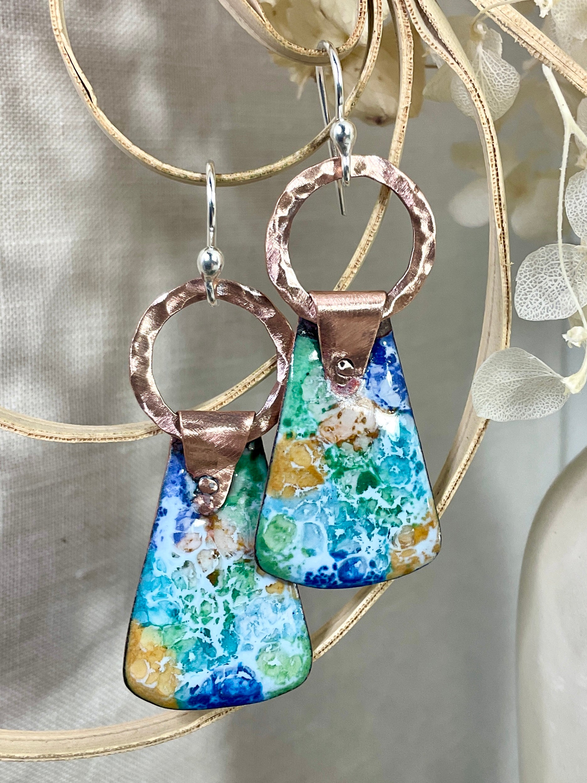 Enamel and copper earrings.