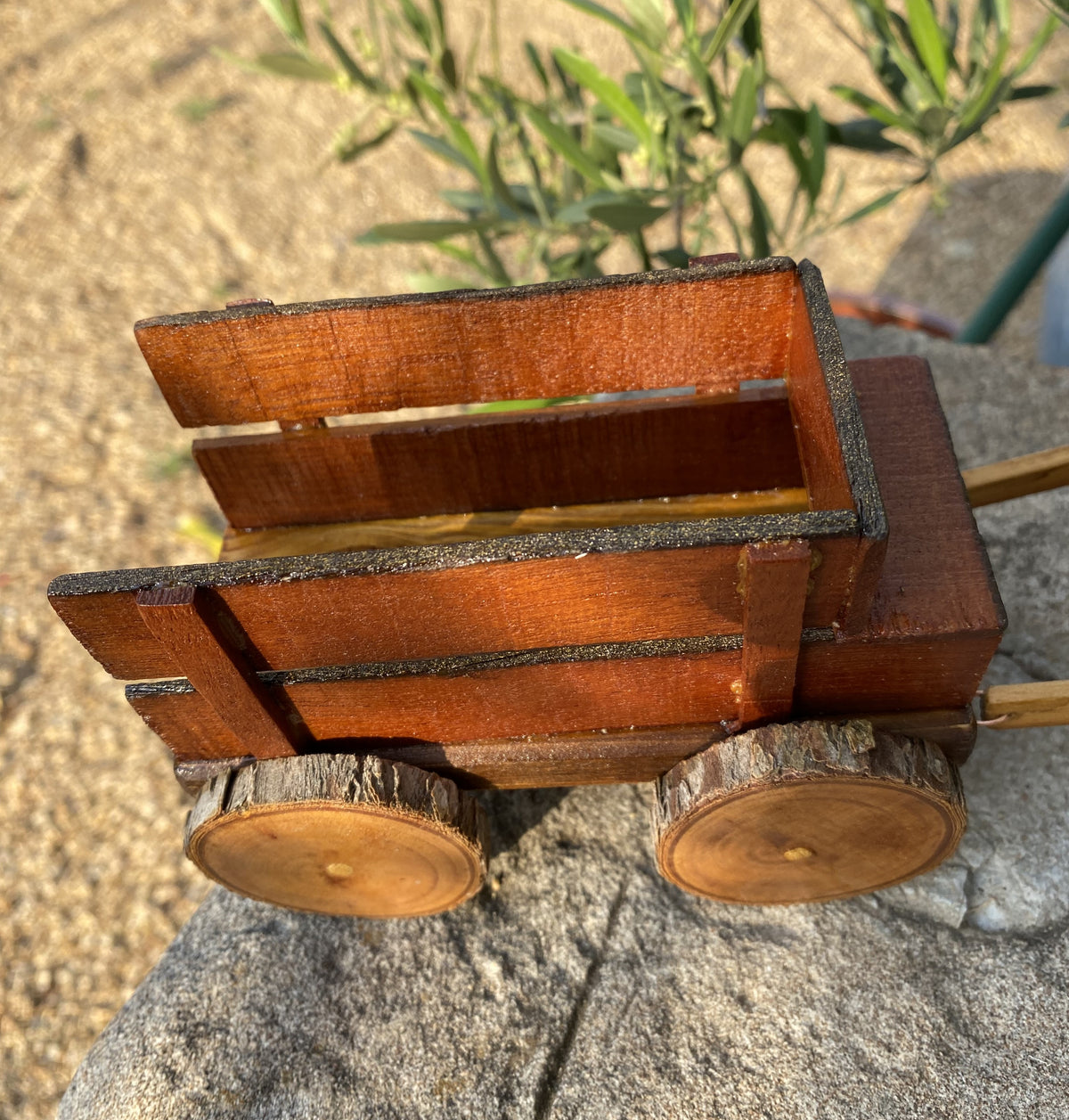 Handmade wooden cow and wagon