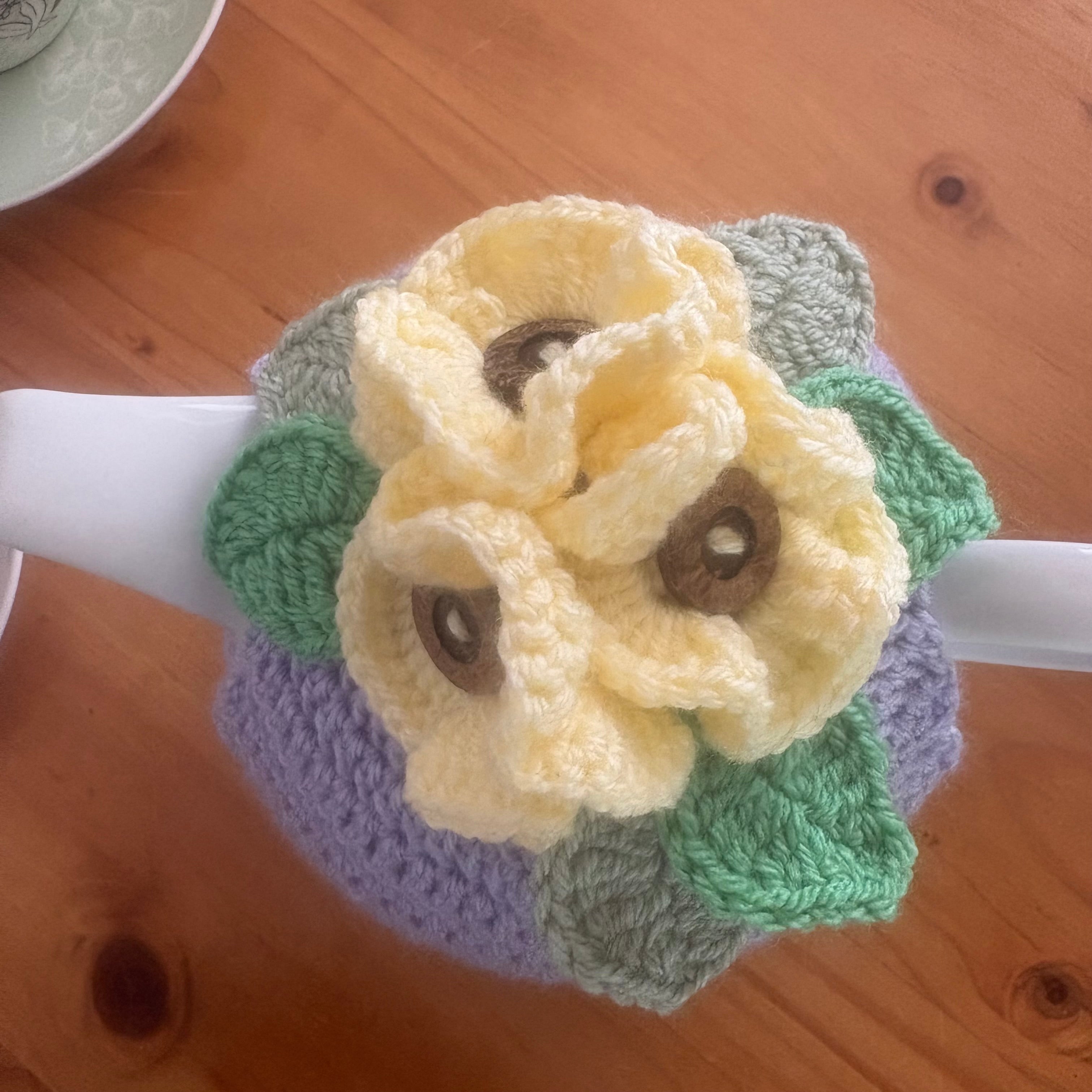 Pretty pansy tea cosy