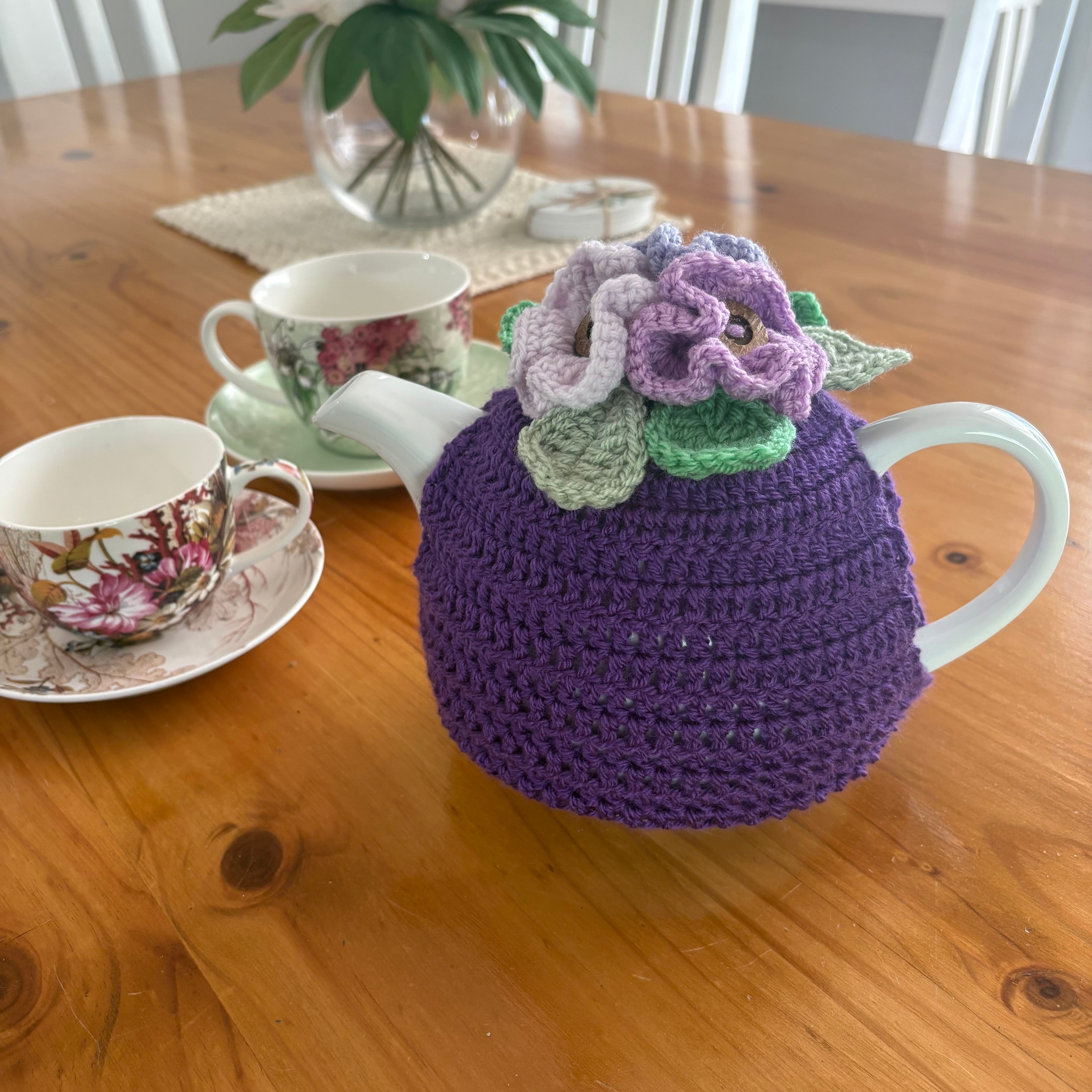 Pretty pansy tea cosy