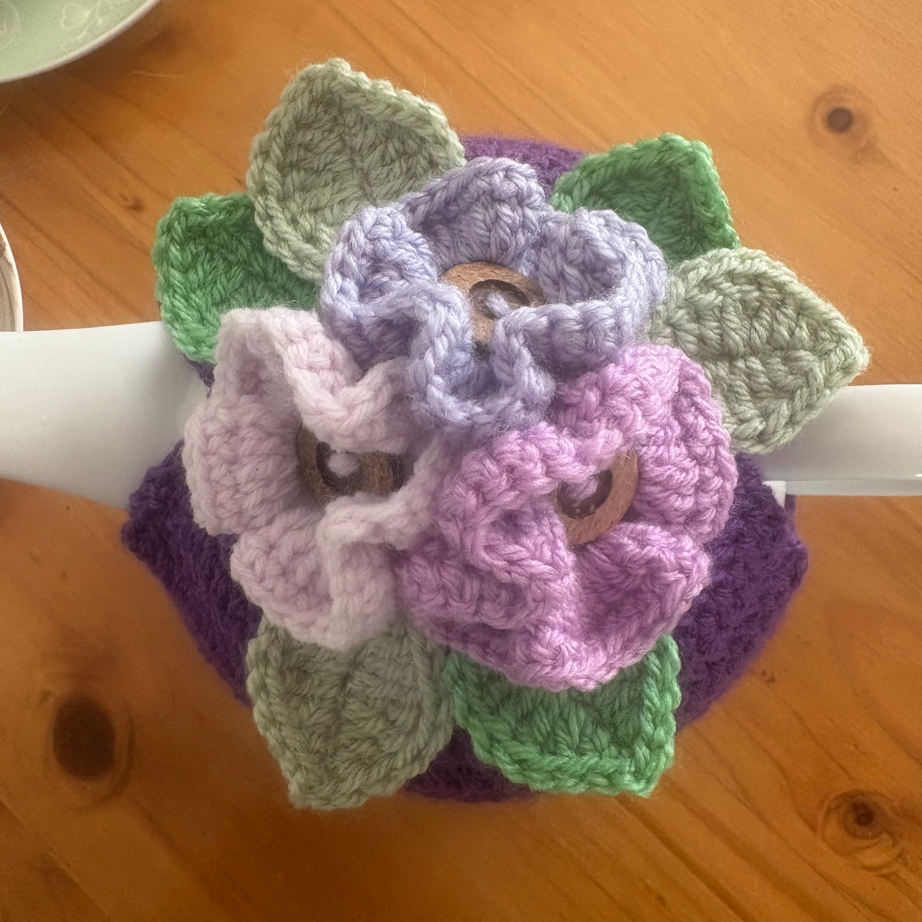 Pretty pansy tea cosy