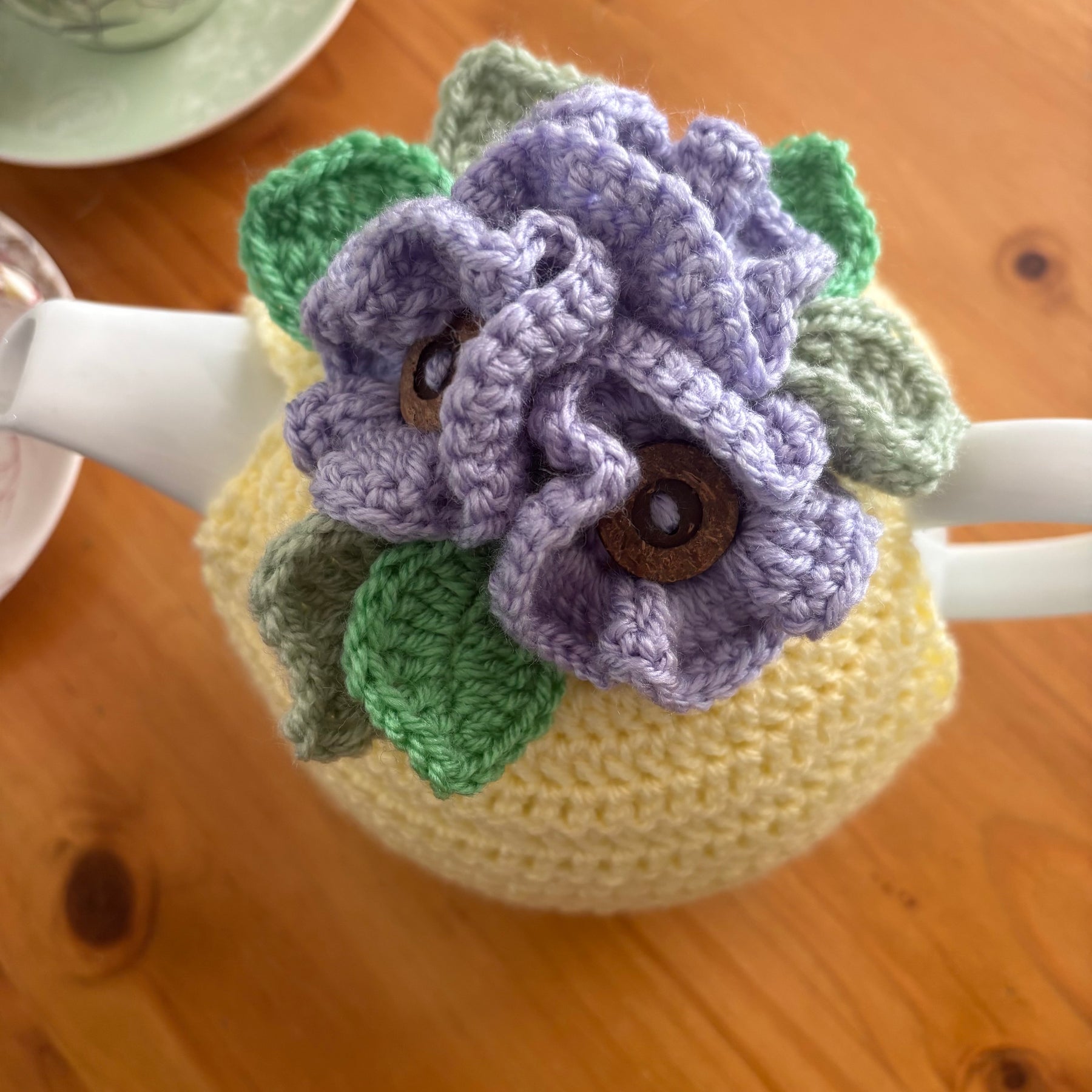 Pretty pansy tea cosy