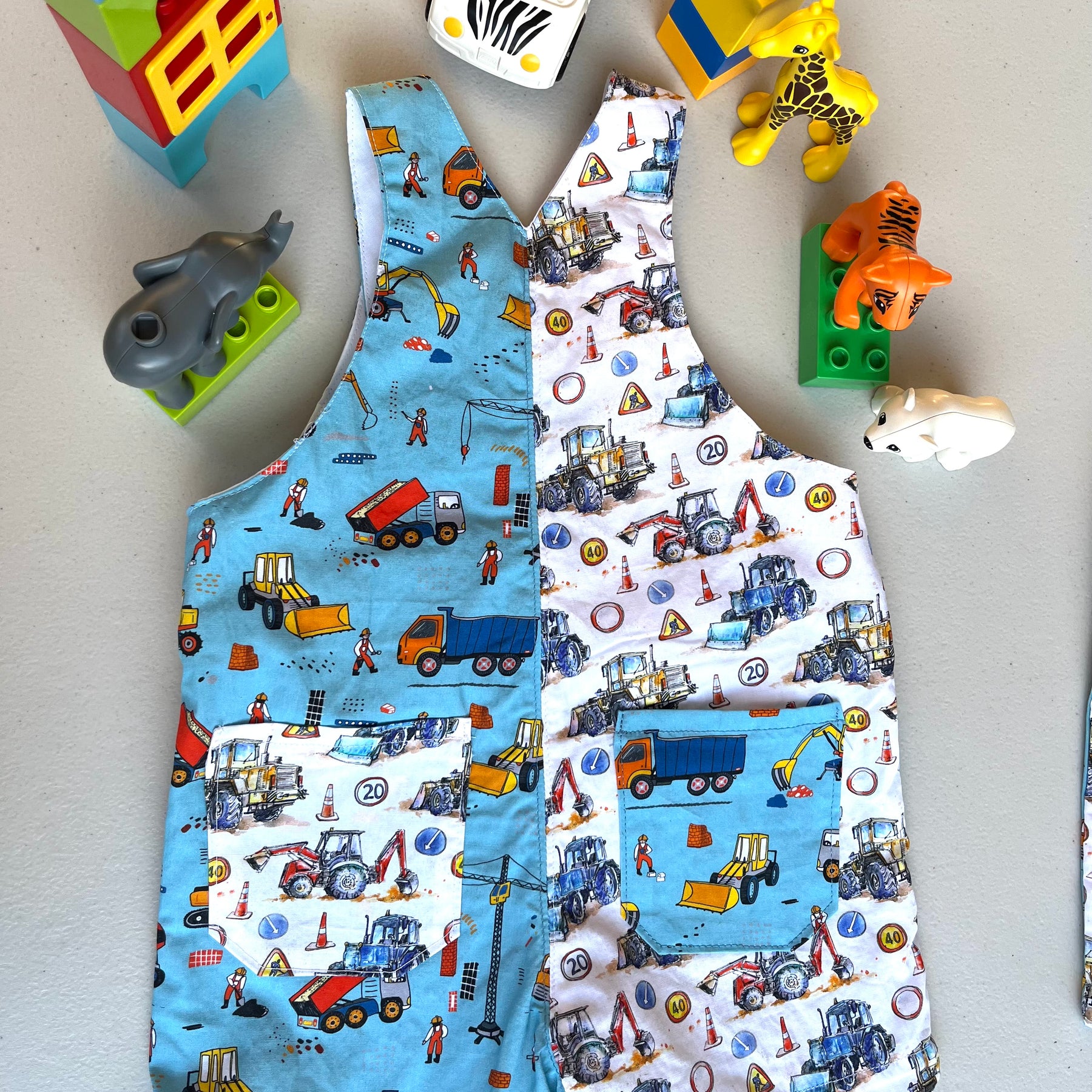 baby overalls/shorts | construction trucks