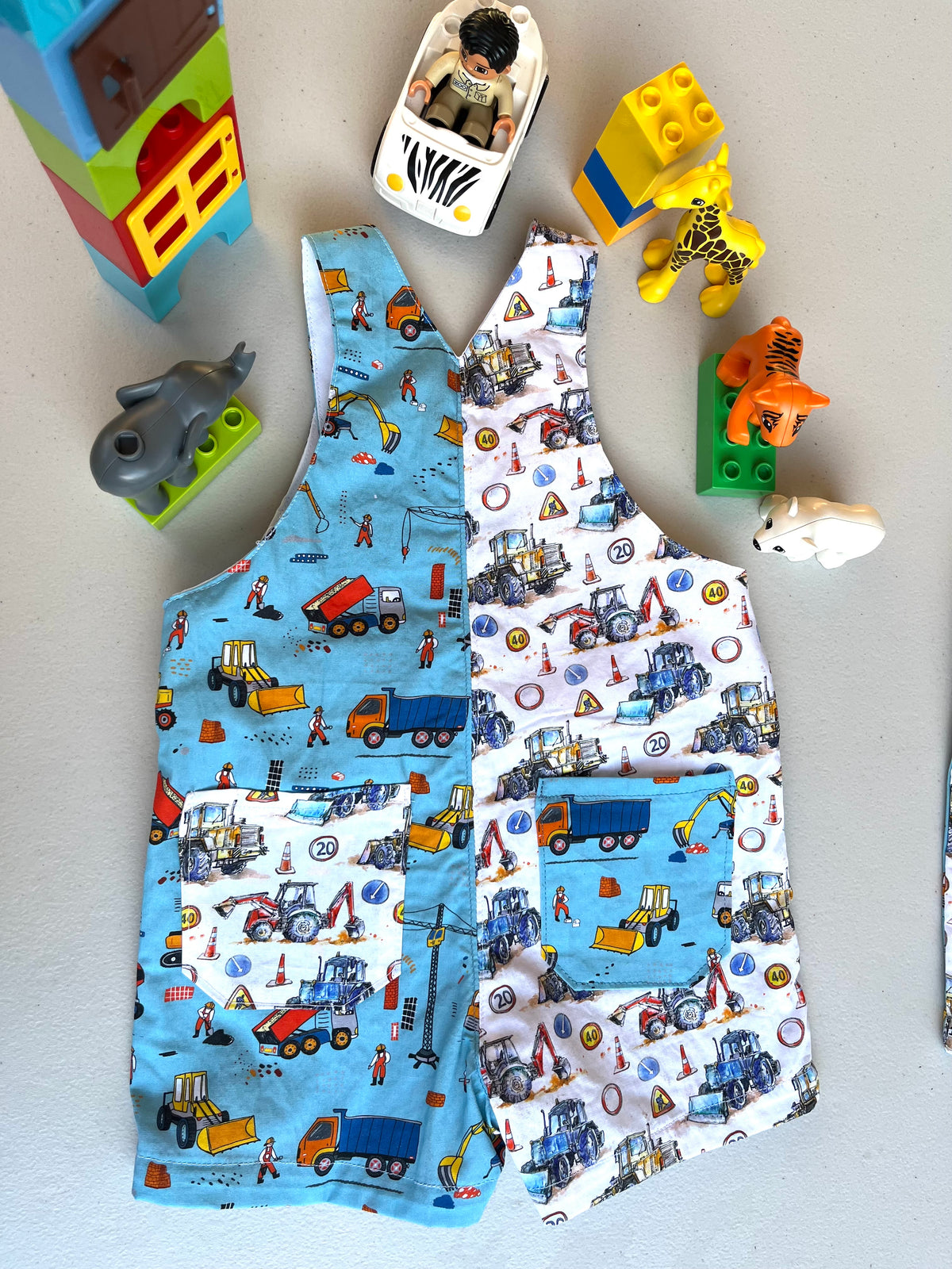 baby overalls/shorts | construction trucks