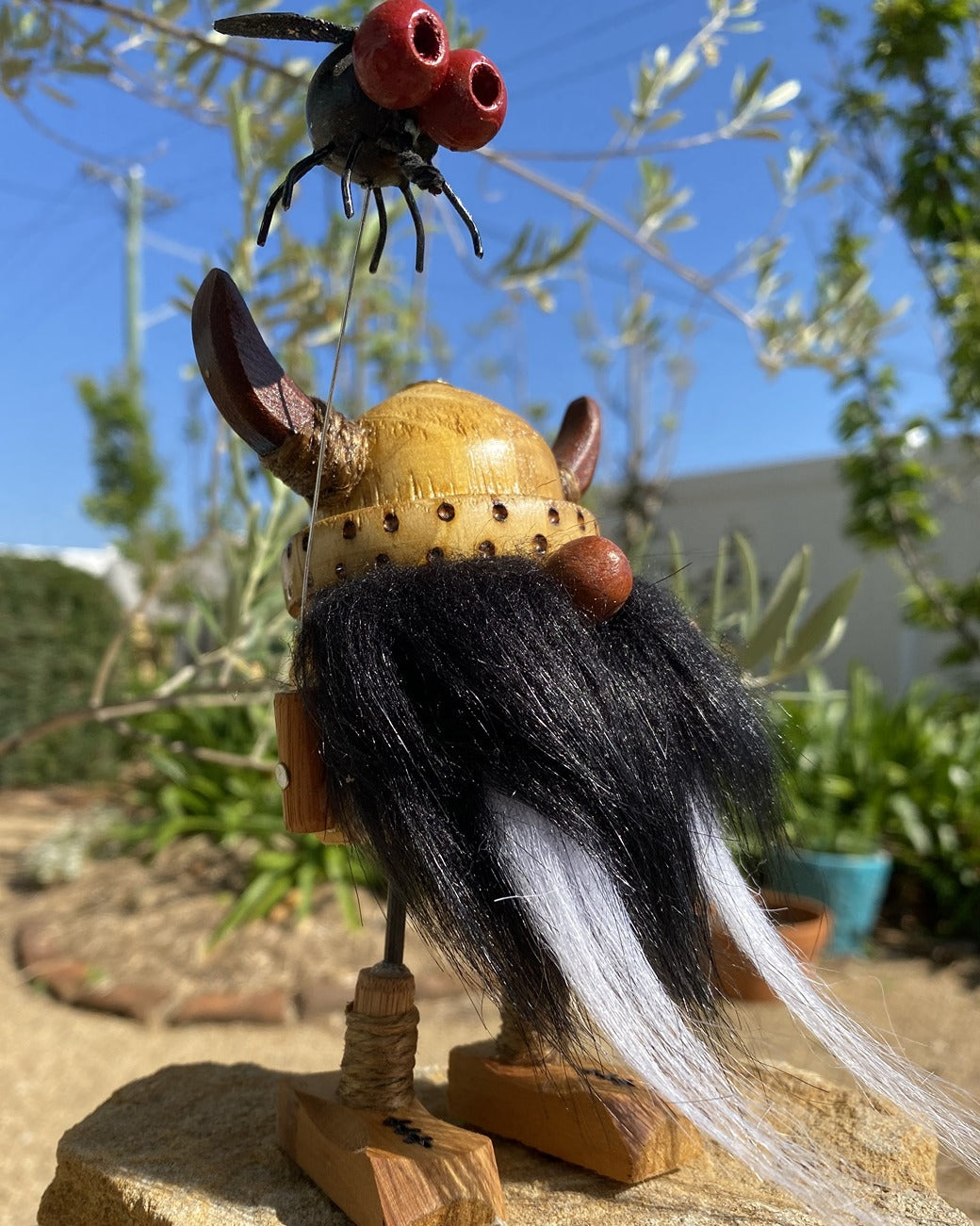 Handmade Wooden Viking Figurine with Pet Fly