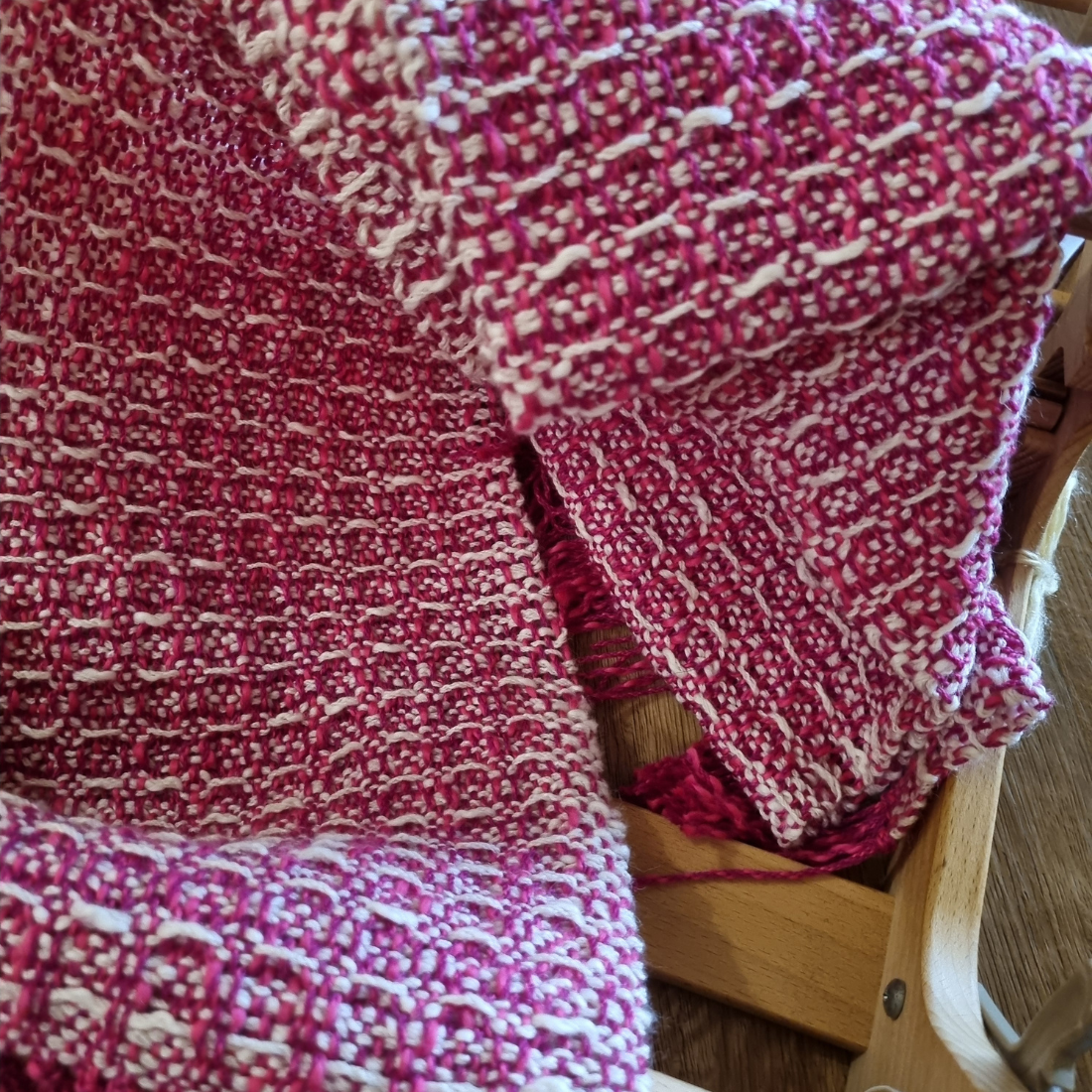 Cozy pink and white waffle-weave scarf