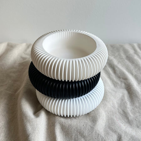 Refillable eco-resin candle holders