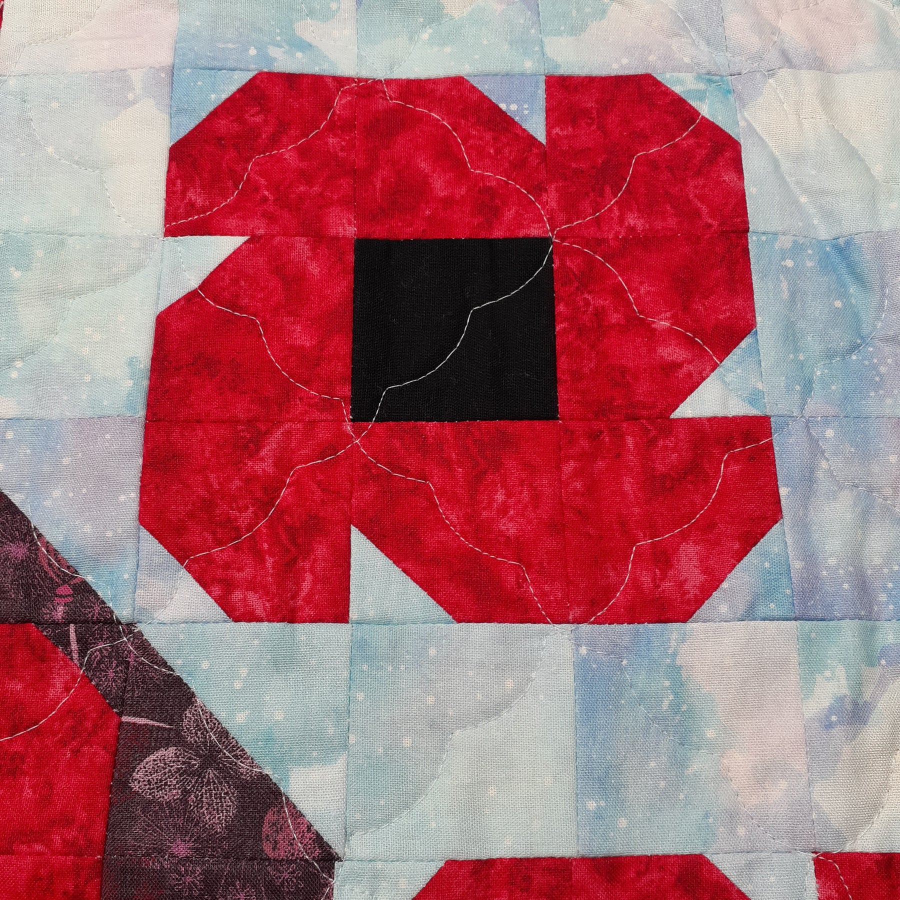 Harry the hare in the poppy field patchwork quilt