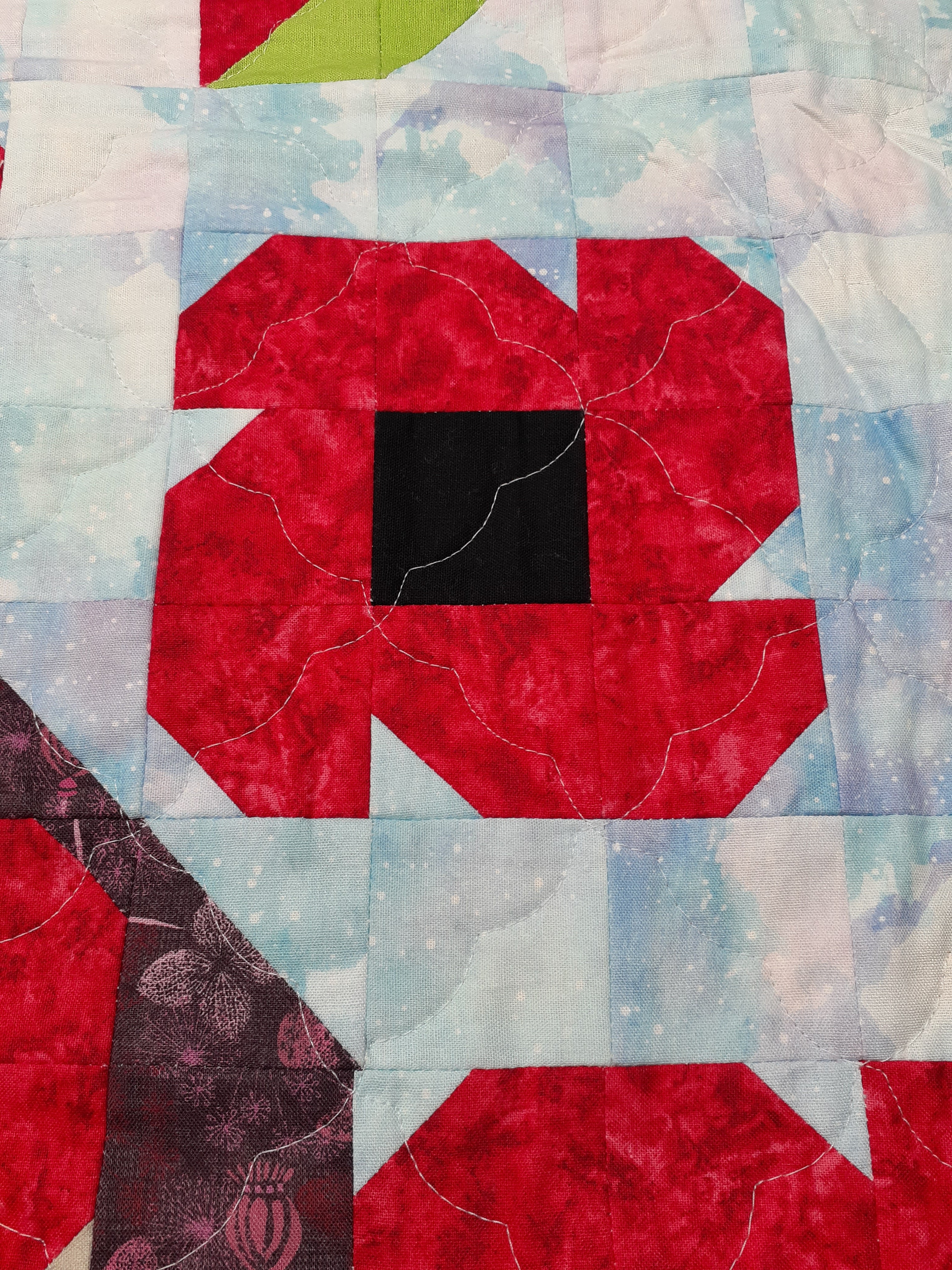 Harry the hare in the poppy field patchwork quilt