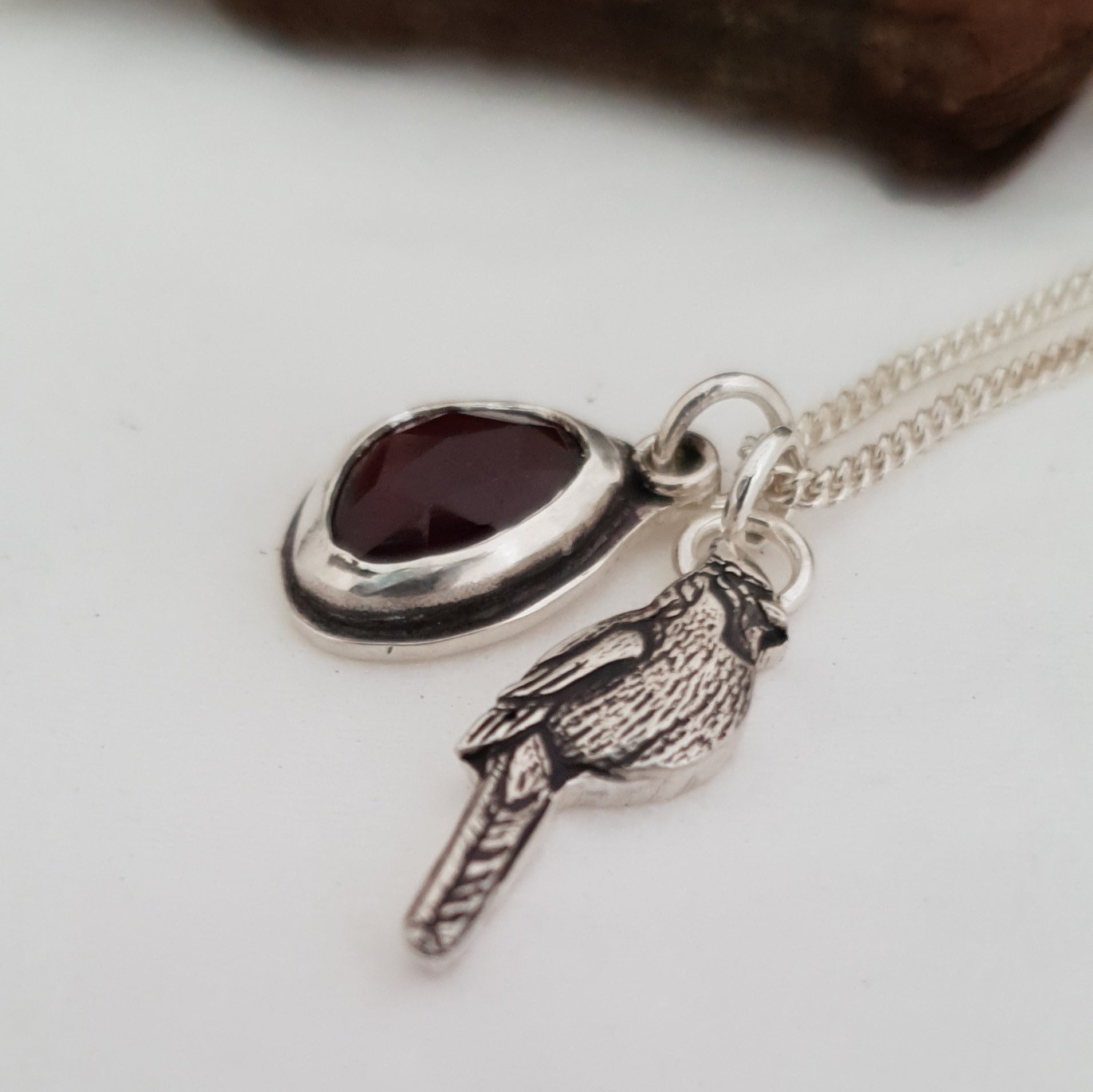 Garnet and cardinal twin pendants