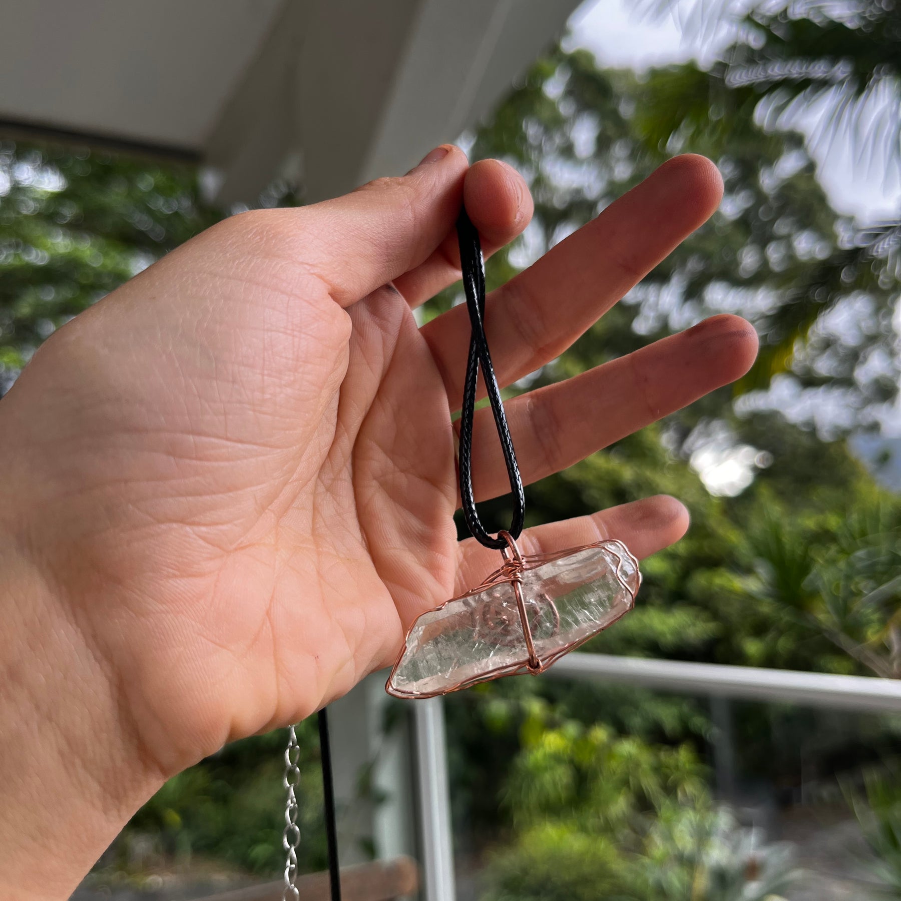 Clear quartz swirl pendant