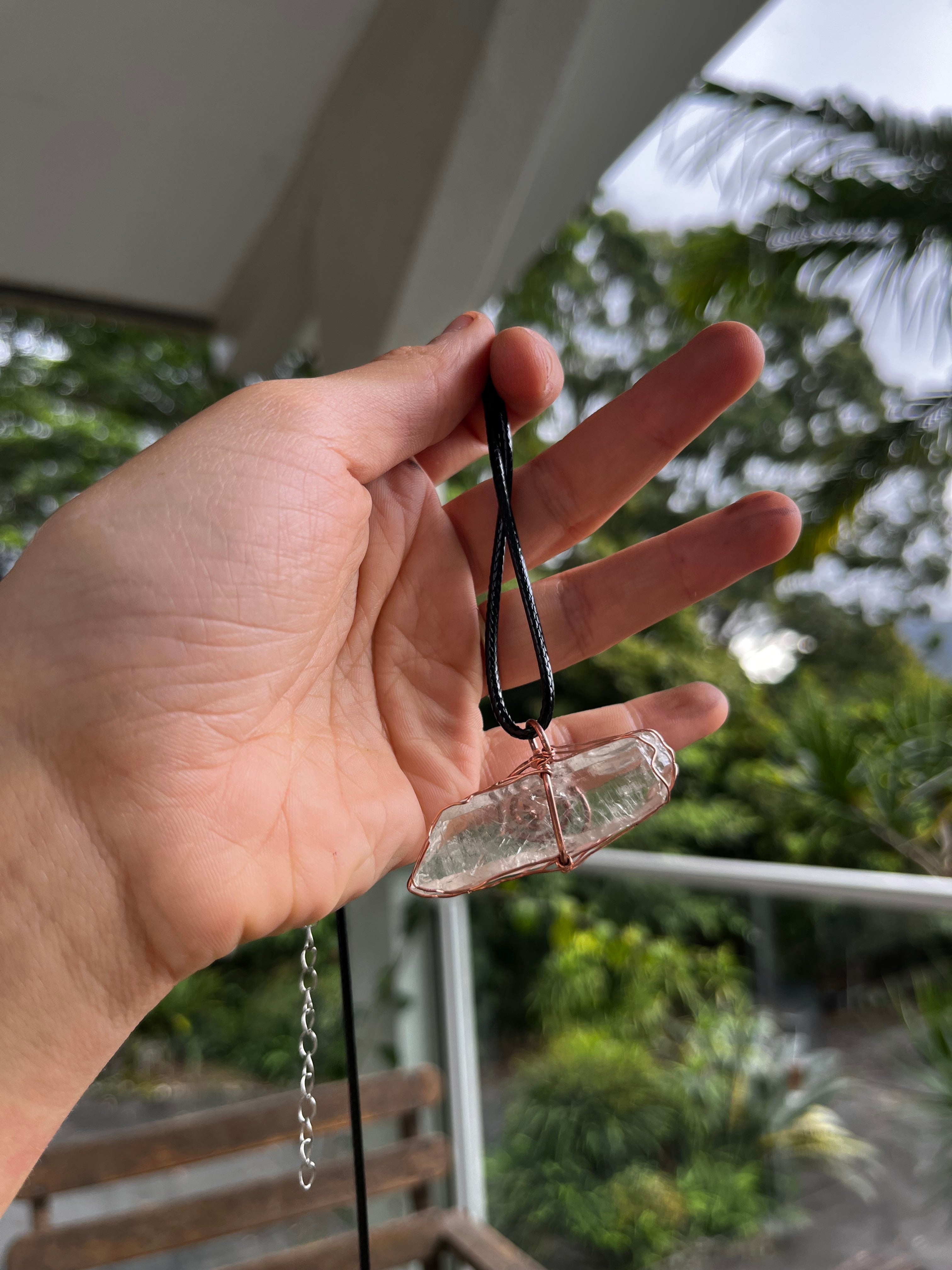 Clear quartz swirl pendant
