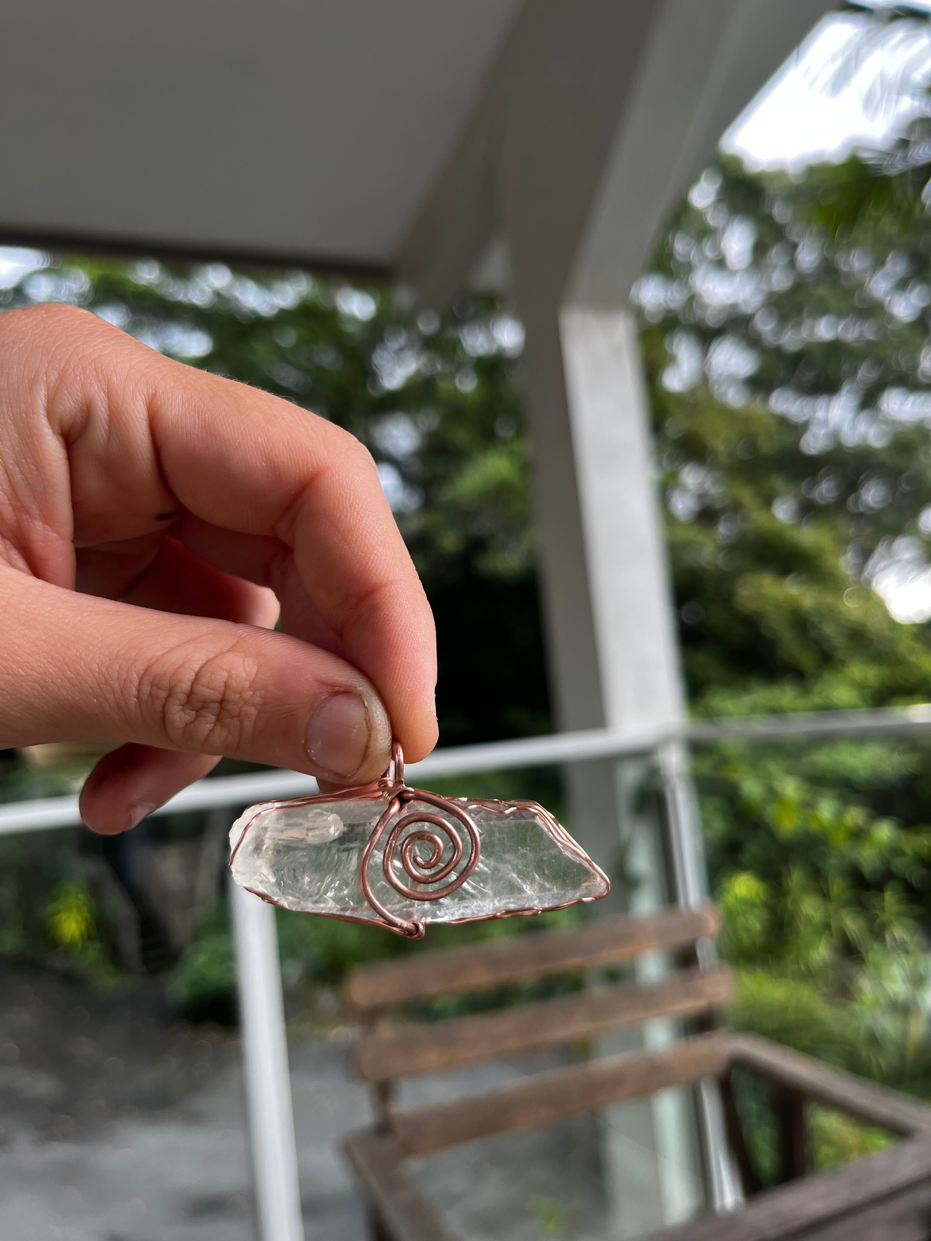 Clear quartz swirl pendant