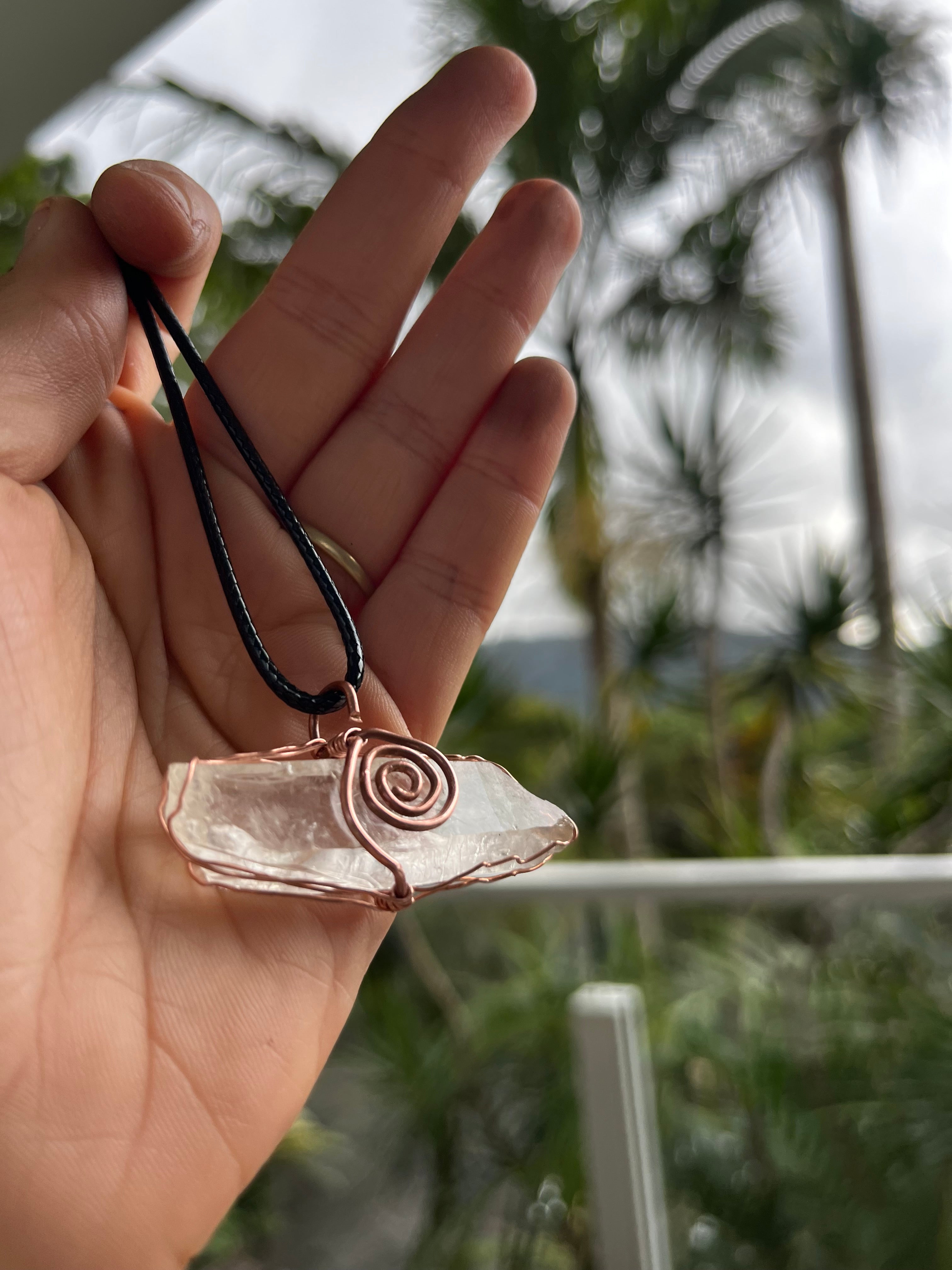 Clear quartz swirl pendant