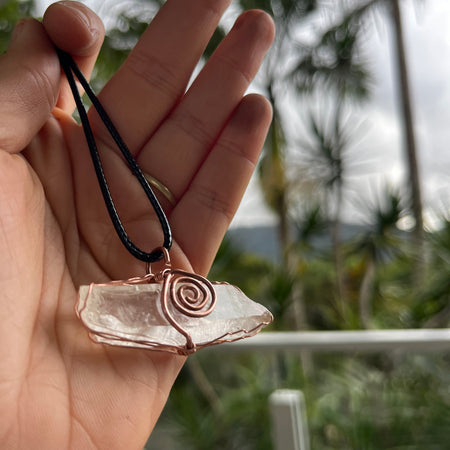 Clear quartz swirl pendant