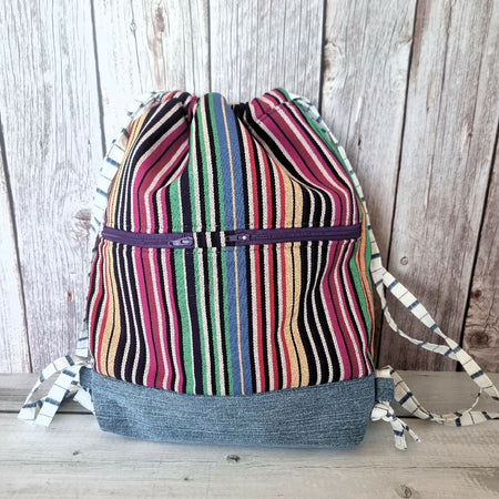 Upcycled drawstring backpack - multicolour stripe with denim