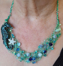 Beaded wire crochet necklace with seahorse focal