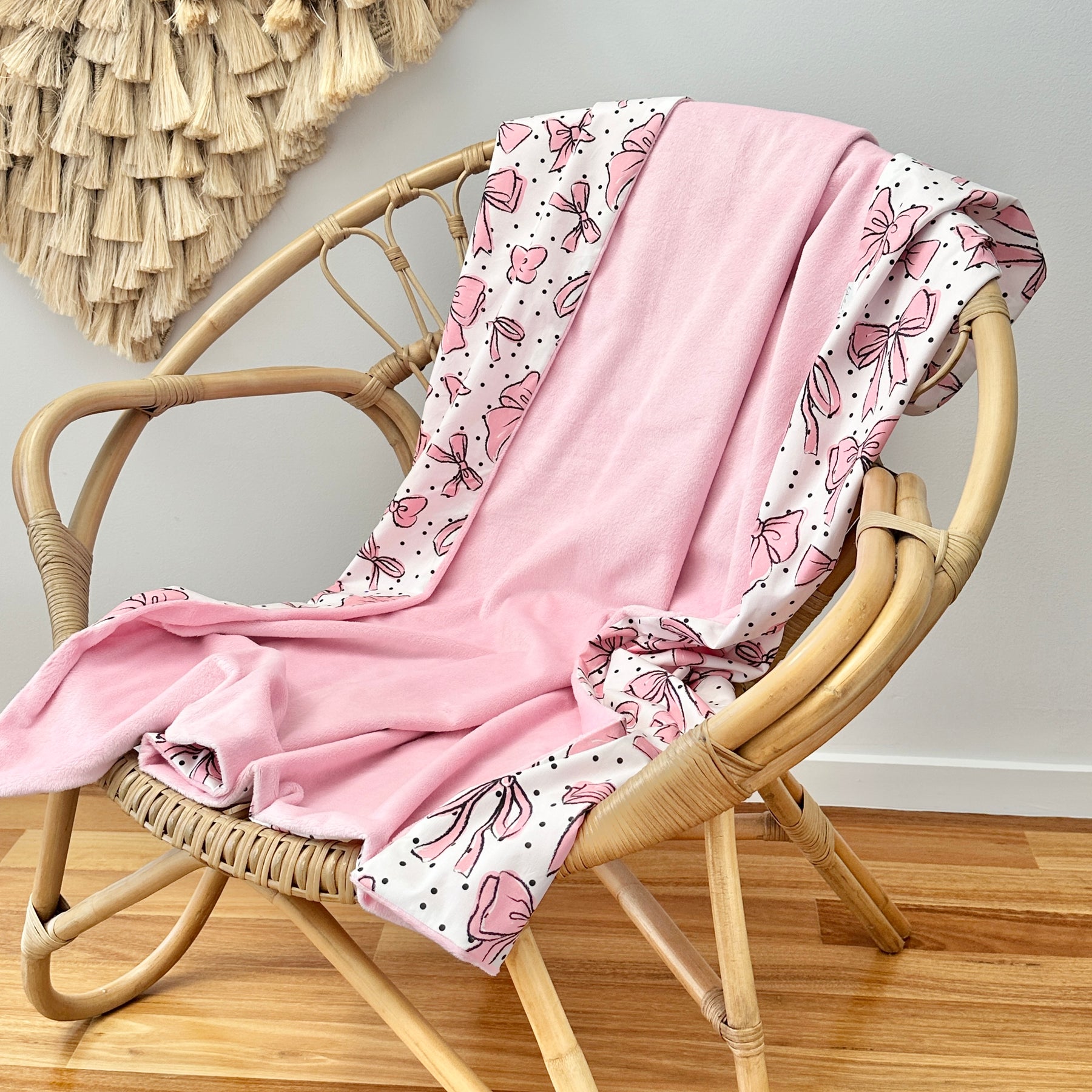 Pink bows Snuggie blanket
