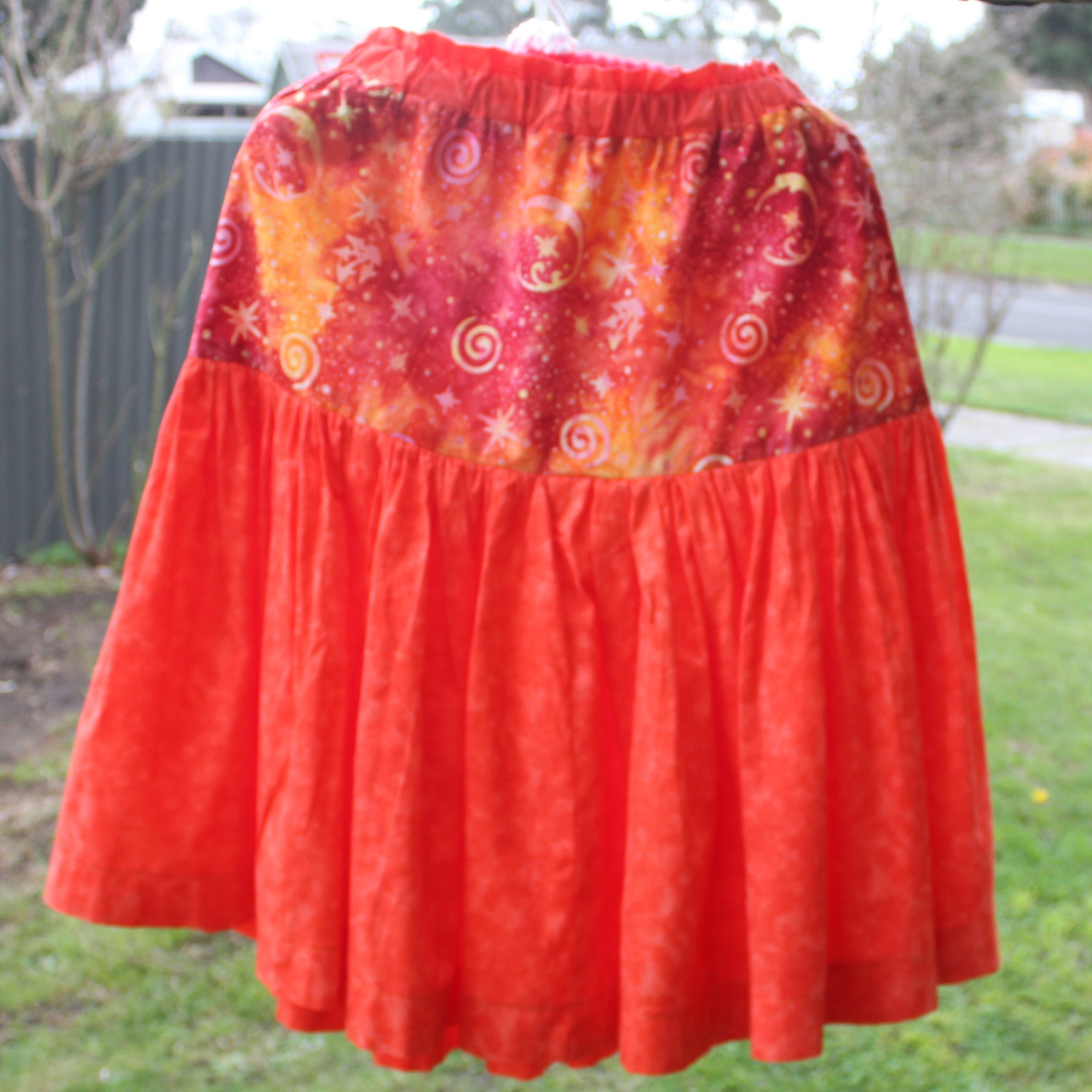 Womens Size Small, Mid Skirt, Orange/Spirals Galaxy.