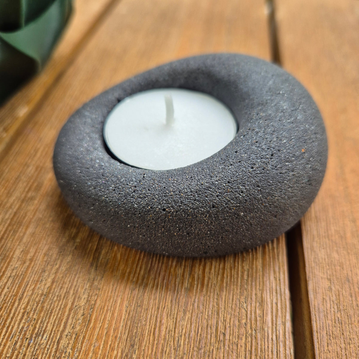 Black eco-stone pebble shaped tealight candle holder