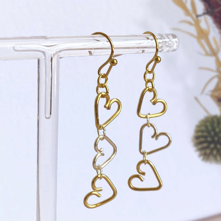 Chain of Hearts gold and silver dangle earrings