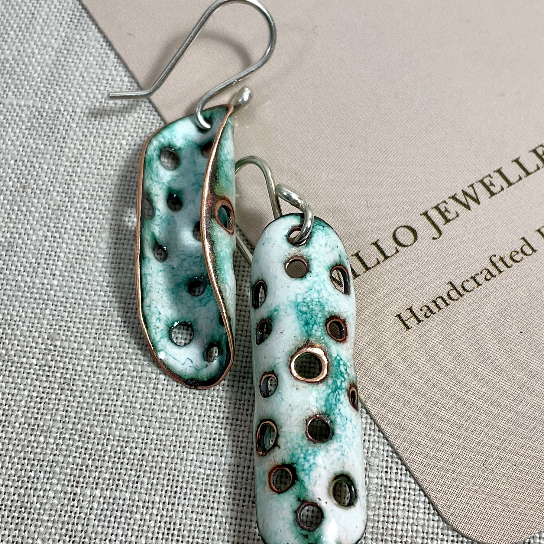 White and teal enamel earrings. Handmade
