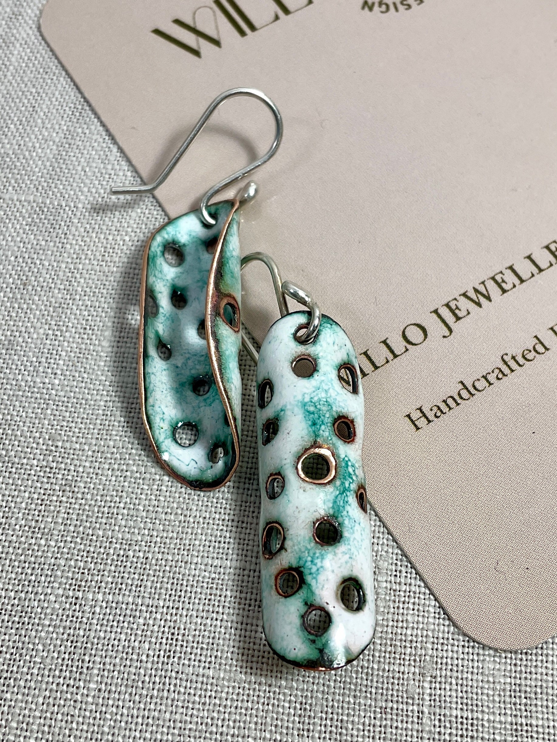 White and teal enamel earrings. Handmade