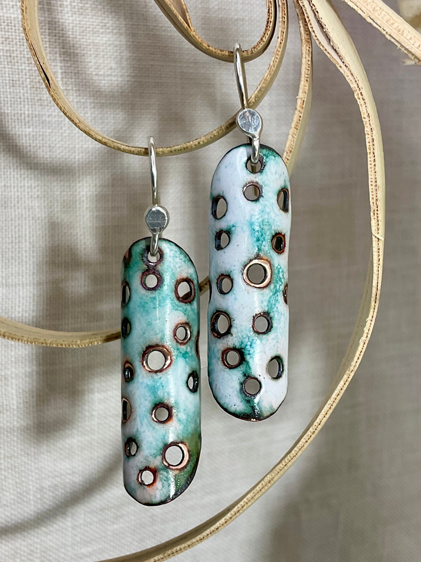 White and teal enamel earrings. Handmade