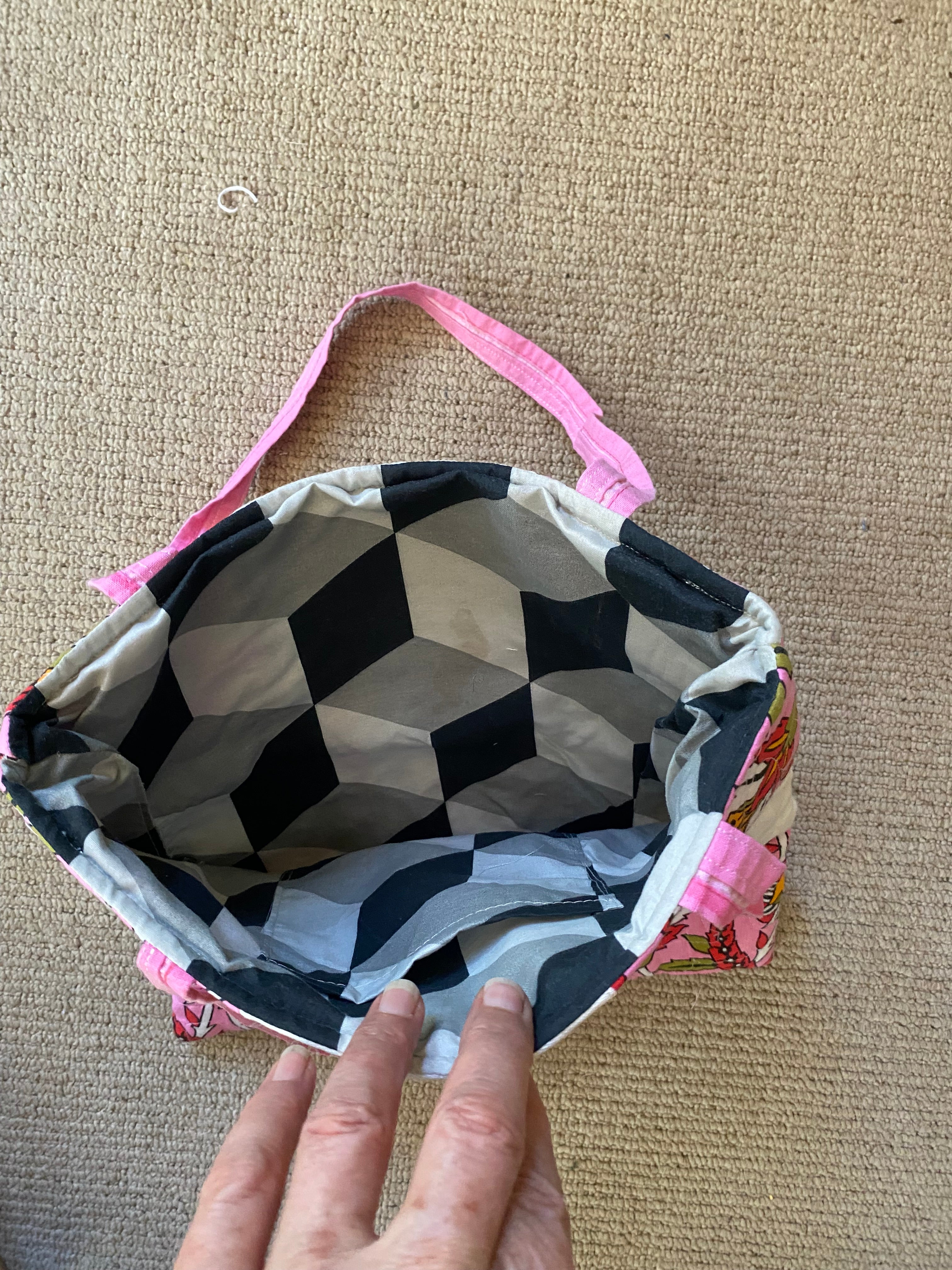Dusty pink floral quilted padded shoulder bag.