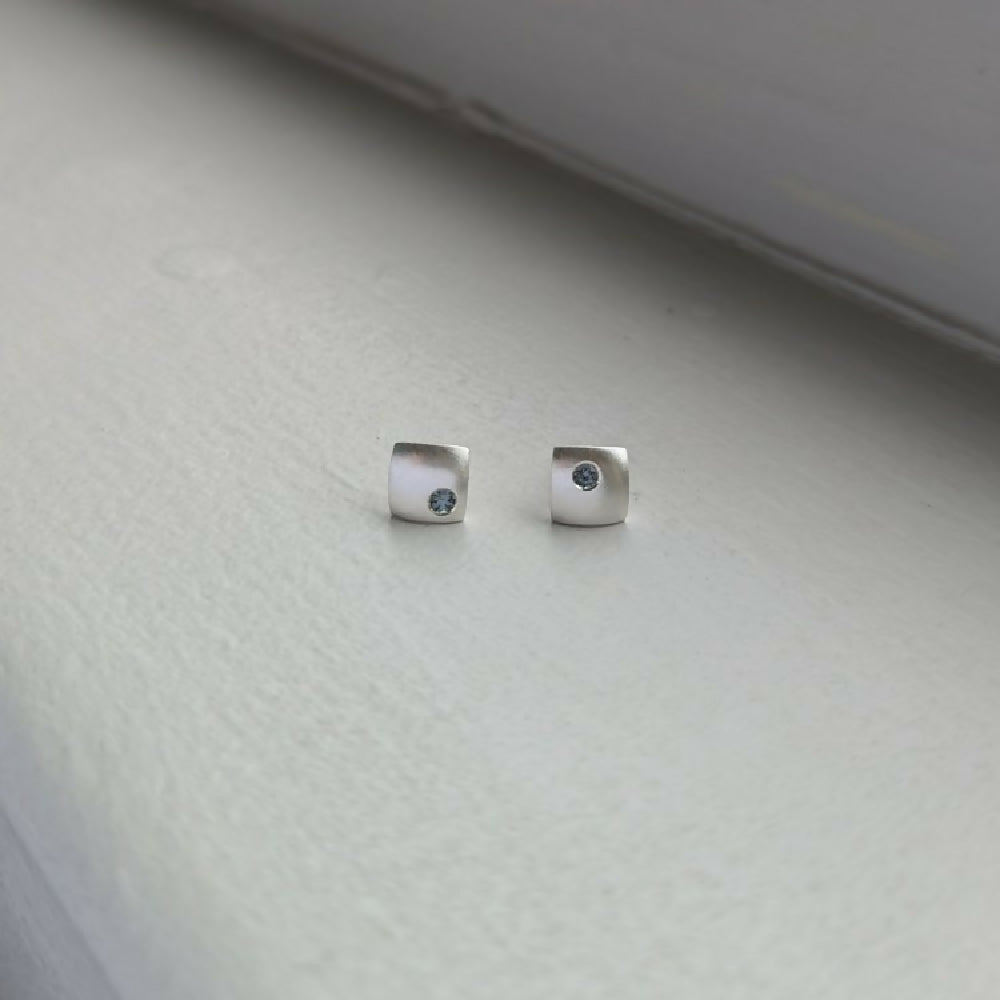 handmade grey spinel × domed square studs